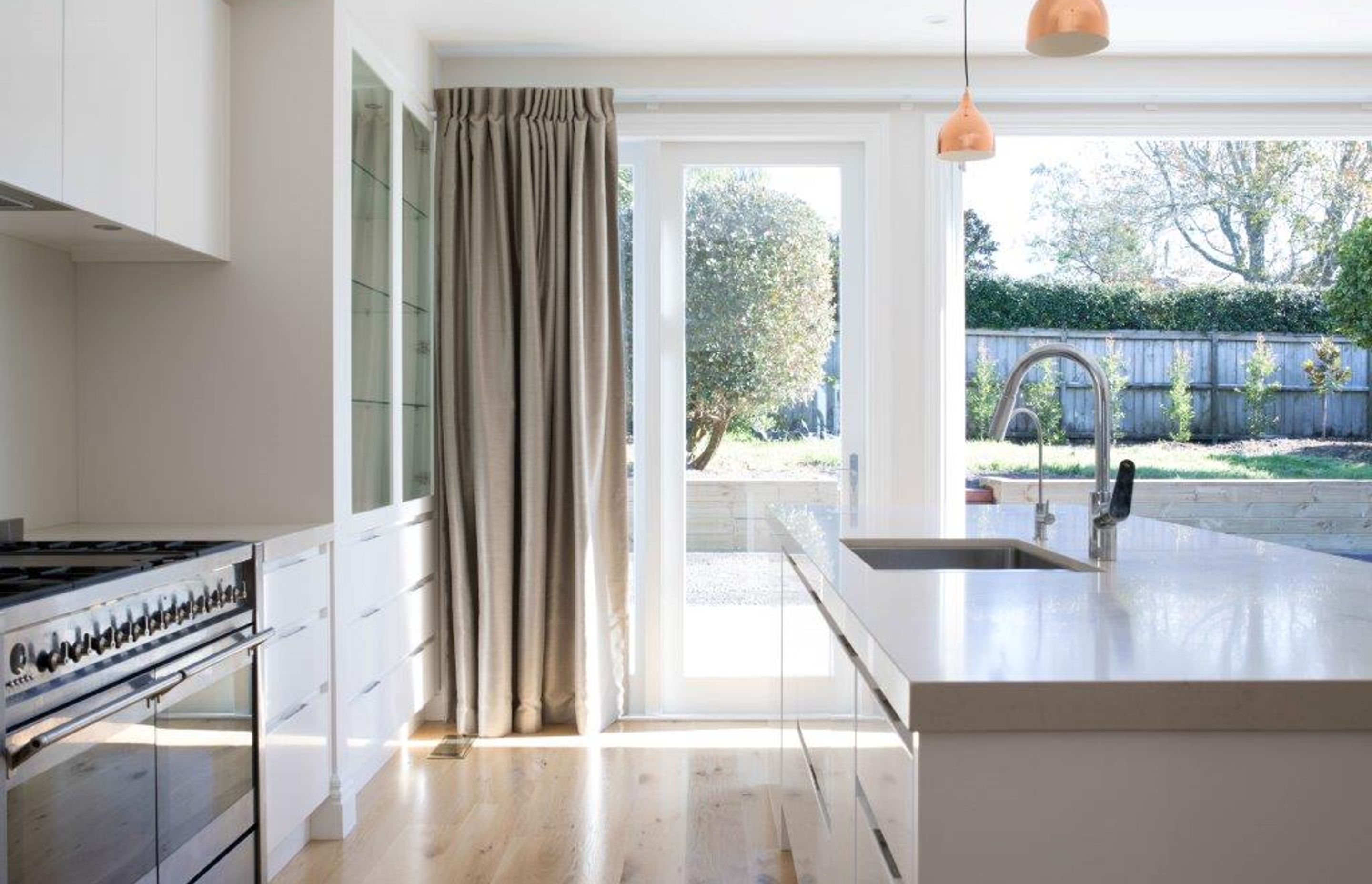 The new kitchen looks out into an open-plan living space, which is ideal for entertaining.
