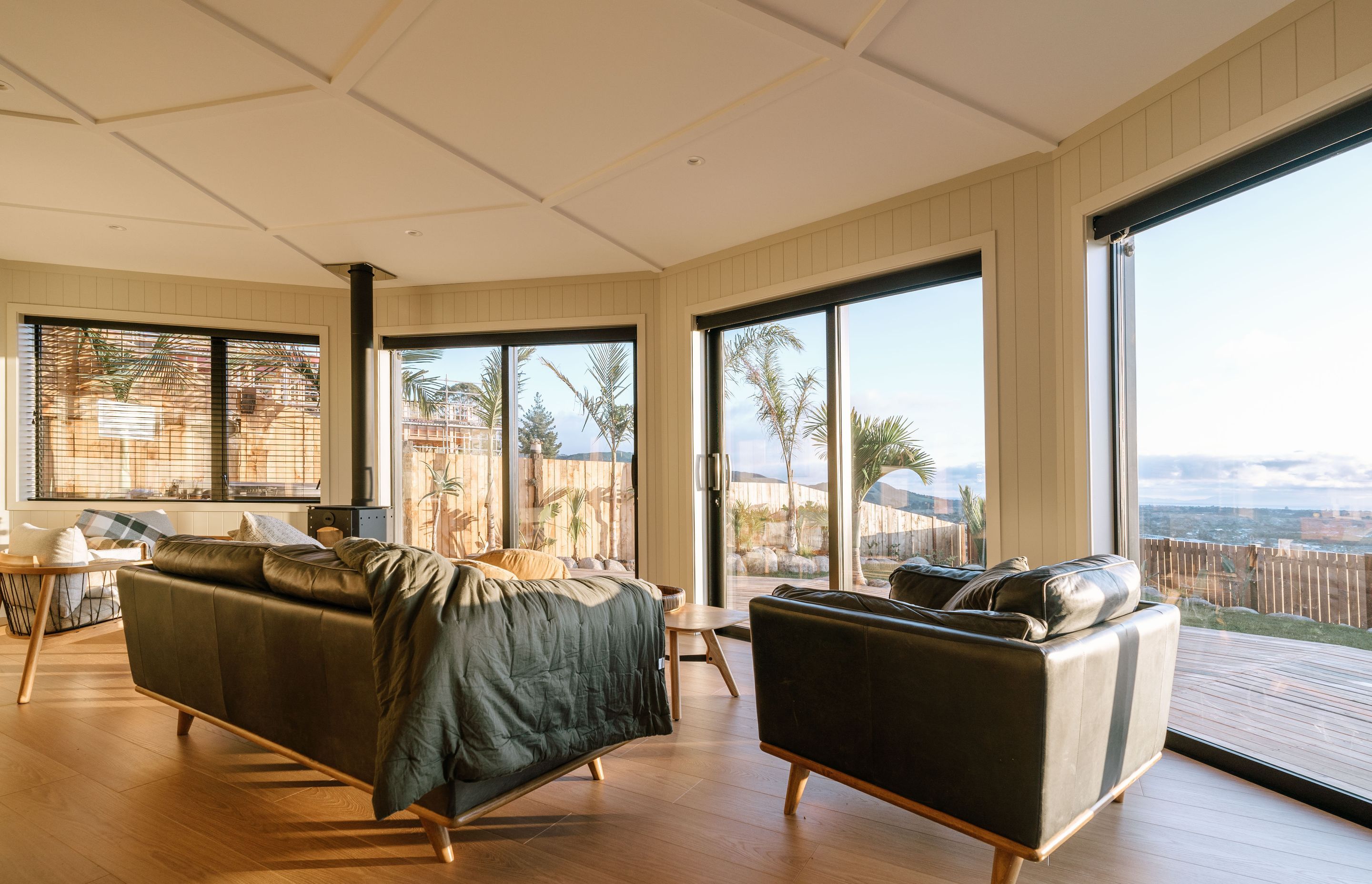 The main living area, with sliding doors opening to the deck.