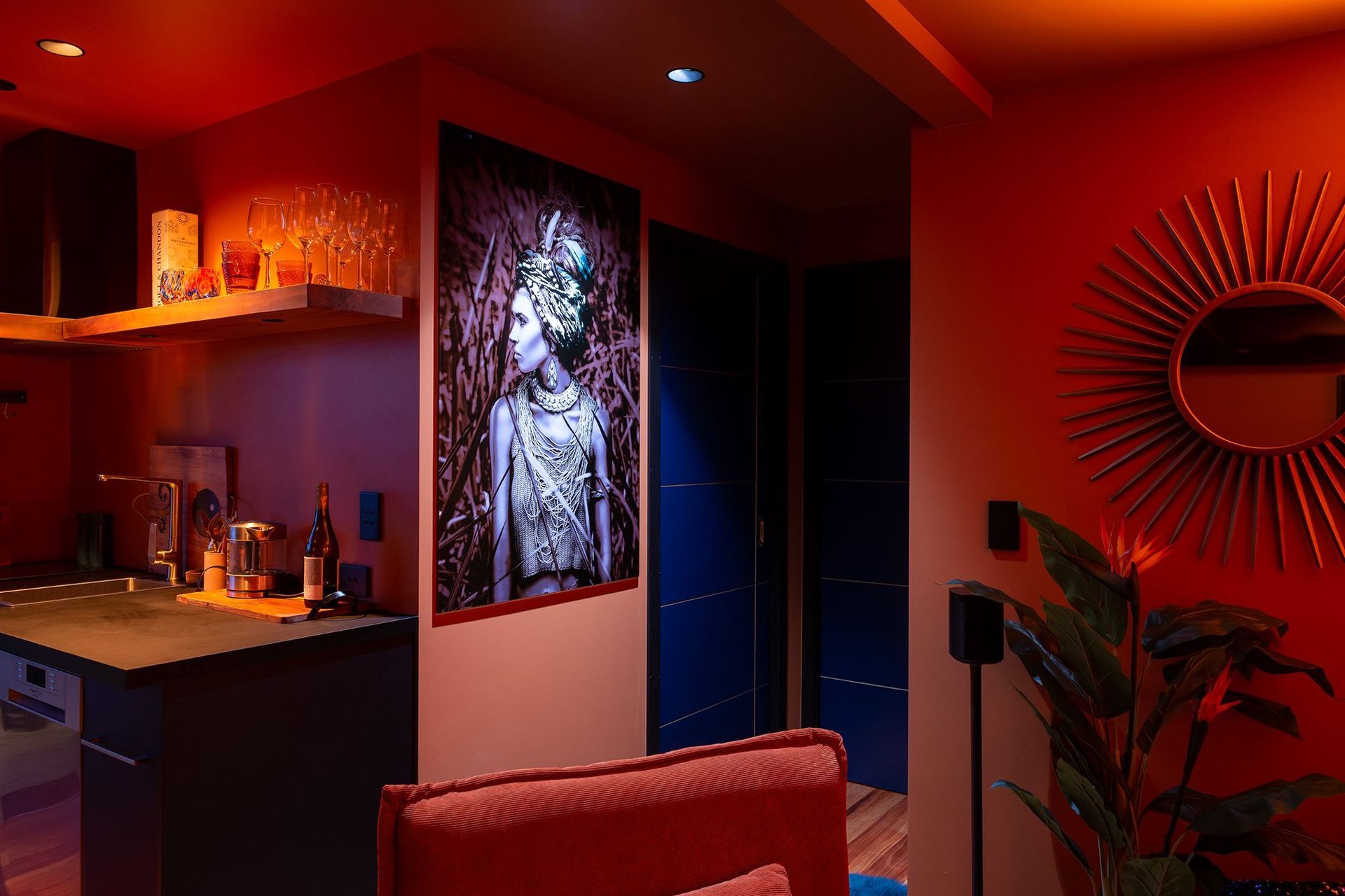 Artwork illuminated at 4000K, managed independently to the luminaires in the kitchenette. Product: Switch Lighting ZELA Deep Tilt SLDL221T, Casambi enabled