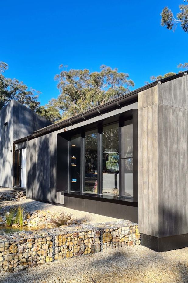 The two forms of the house slope in opposing directions – one side best utilises the sun for the solar panels whilst the other allows solar penetration into the house.