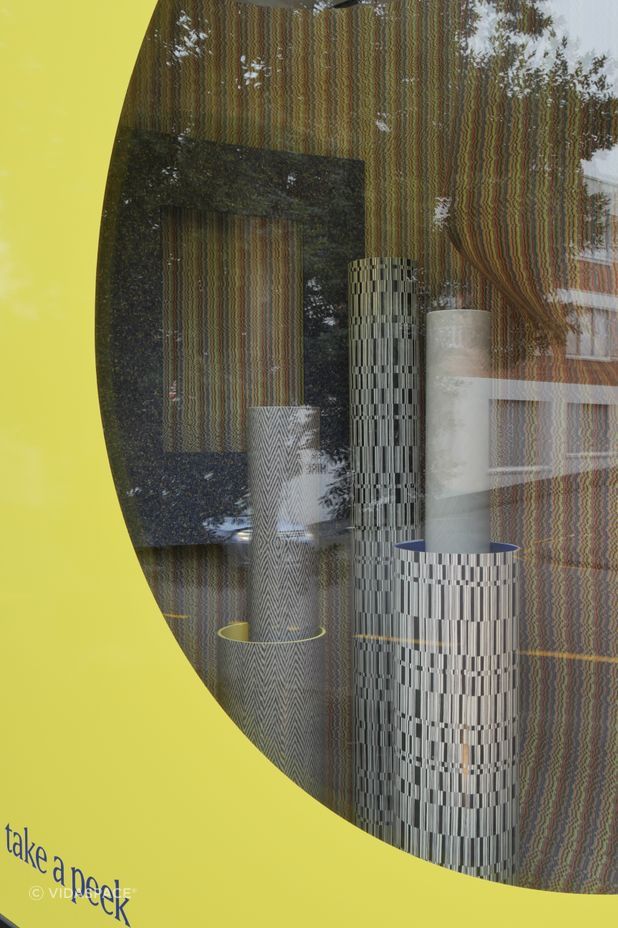 Take a Peek Window Display