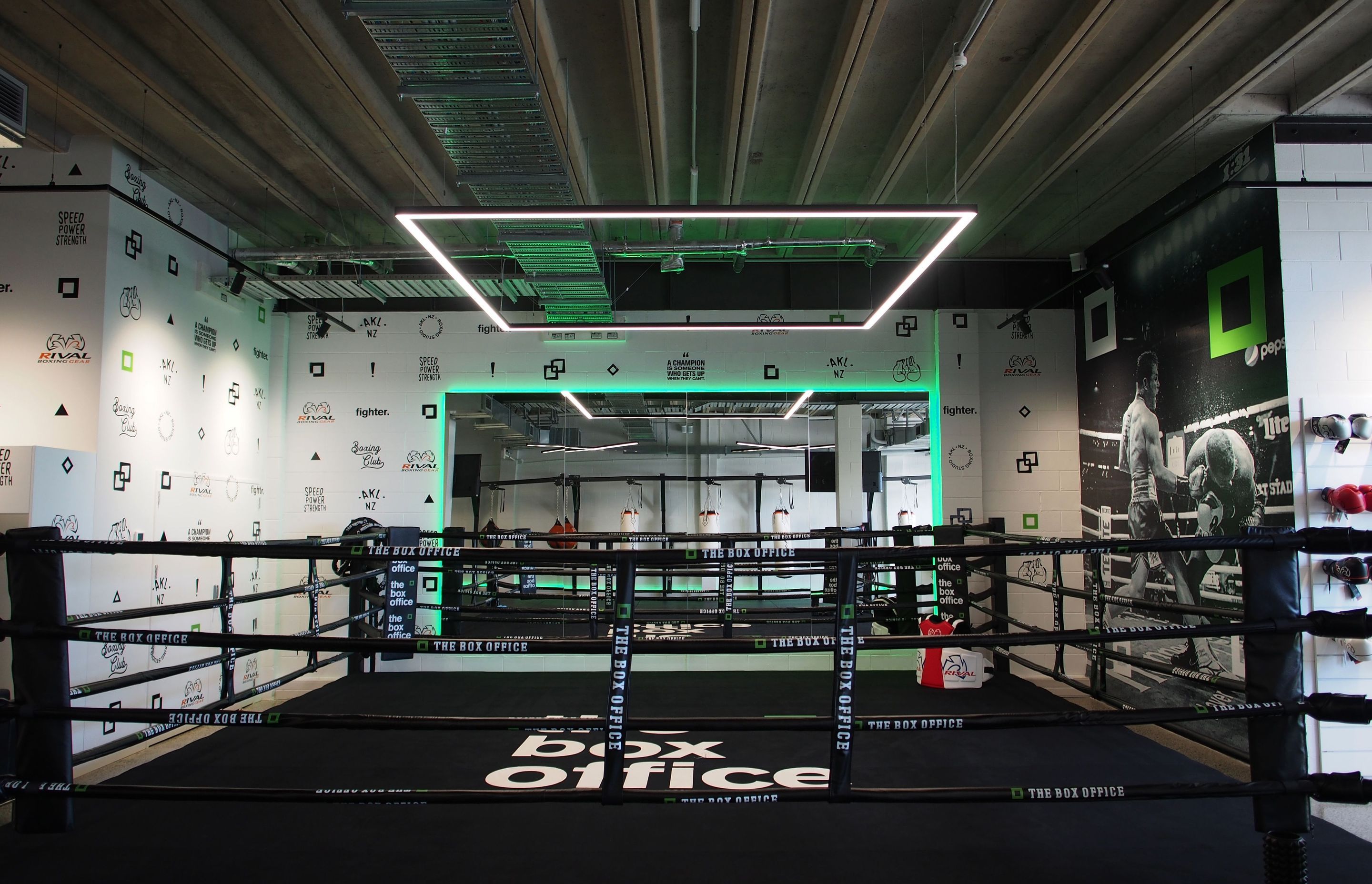 The custom square pendant takes centre stage over the boxing ring.