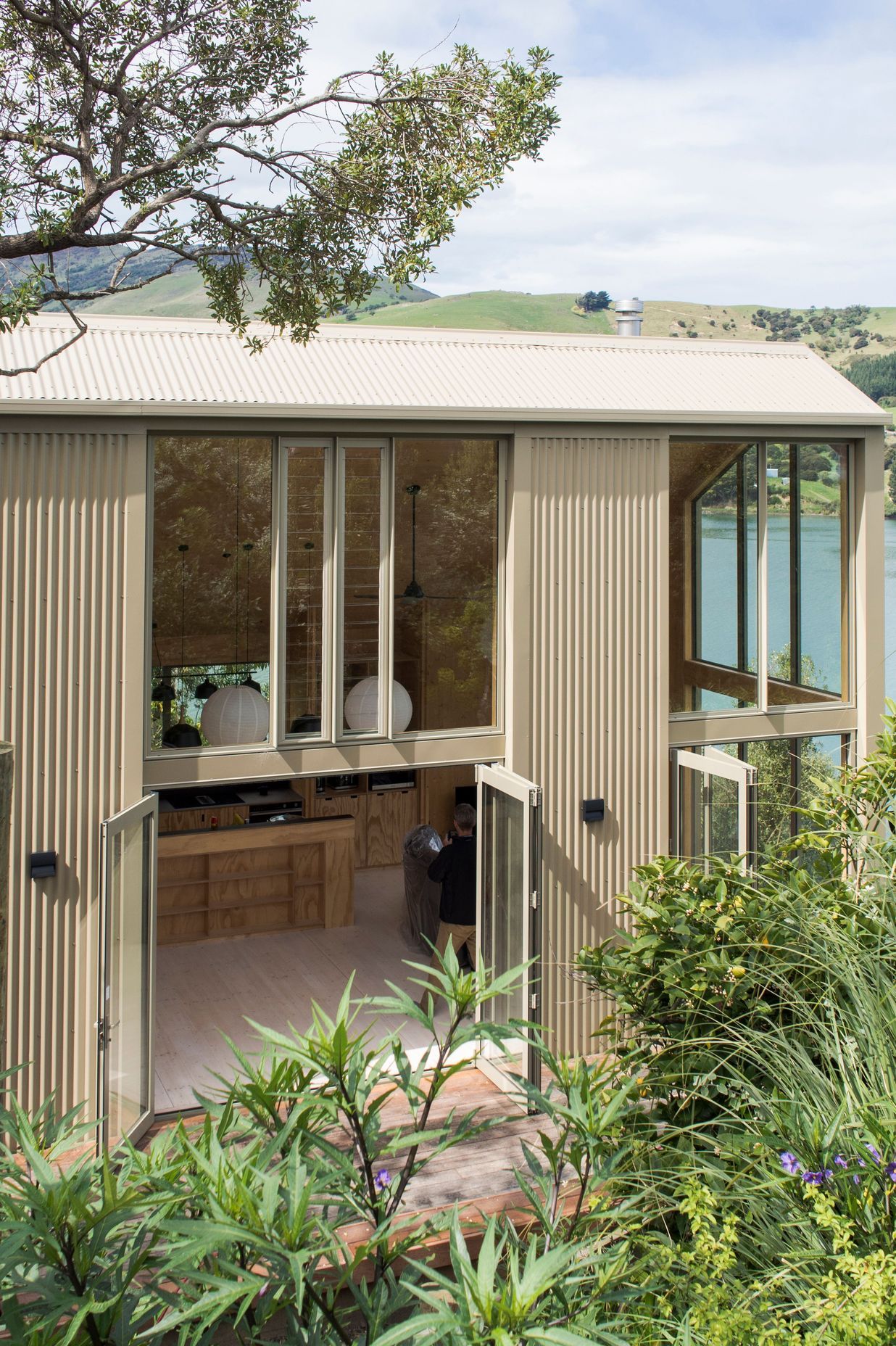 Blanks House in Robinson Bay, Christchurch, by Bonnifait + Giesen, is glazed to maximise sunlight from every direction. Photograph by Russell Kleyn.