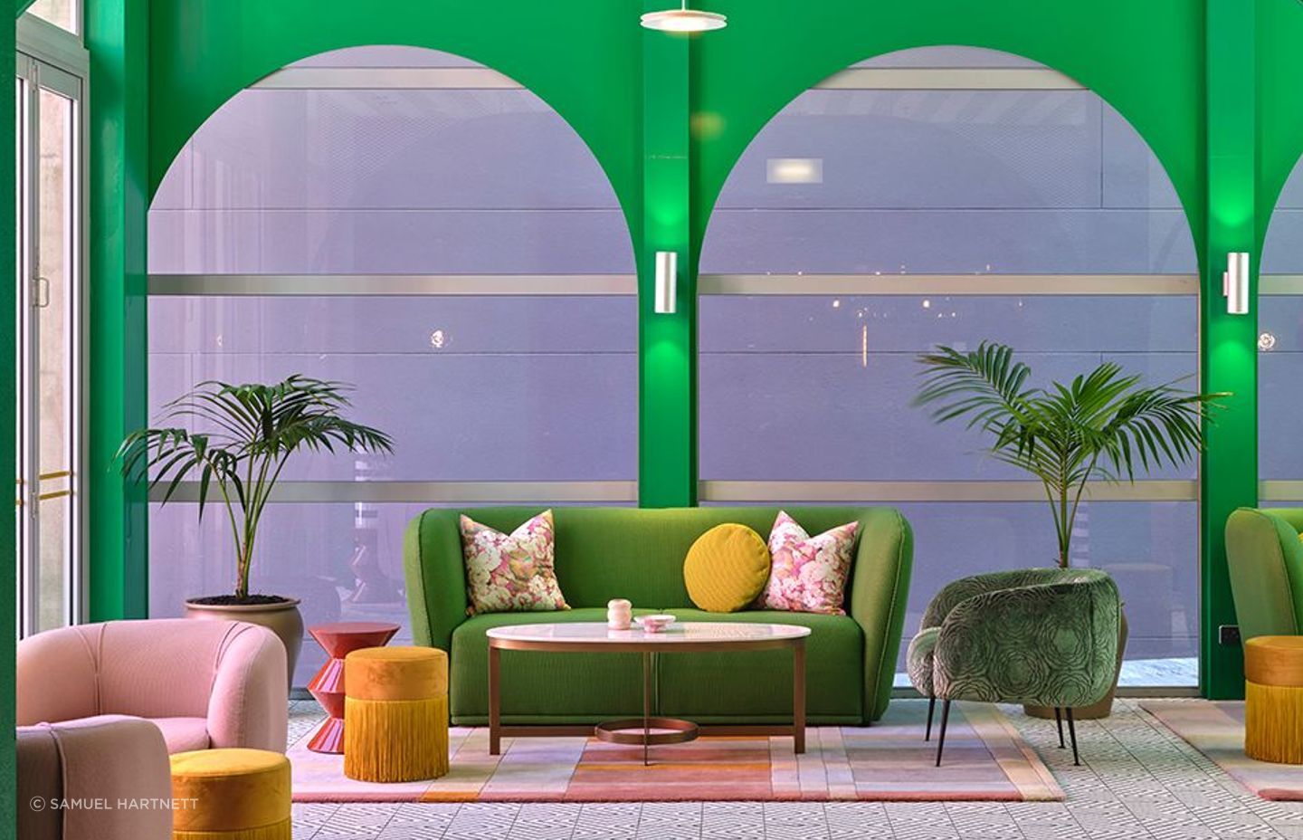 The fresh look of the parlour. Covid-19 caused product supply issues, which meant much tweaking to the mix of colours and materials. The fringed poufs are by Houtique and the green chair is covered in Mokum Water Lily fabric from James Dunlop Textiles.