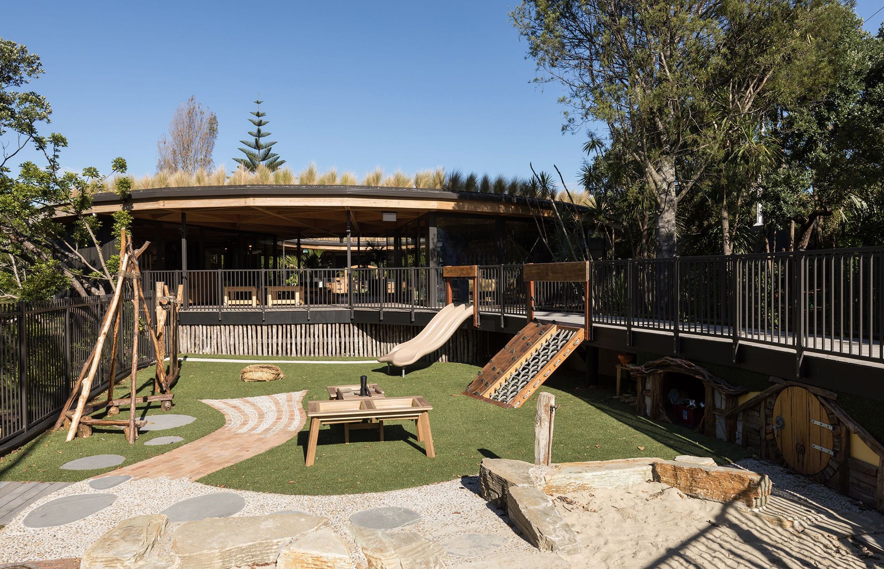 The lower playground, designed with hobbit holes beneath the walkway. | Photographer: Mark Scowen