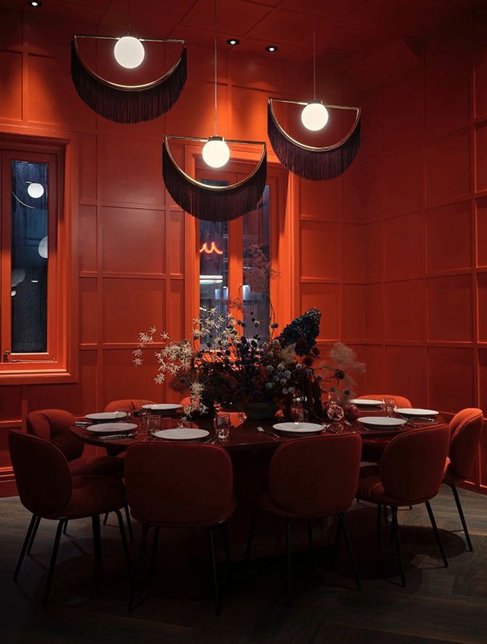 The pendants in the private dining room are by Houtique. “In the nick of time, they arrived pretty much the day before the opening,” says Toni.