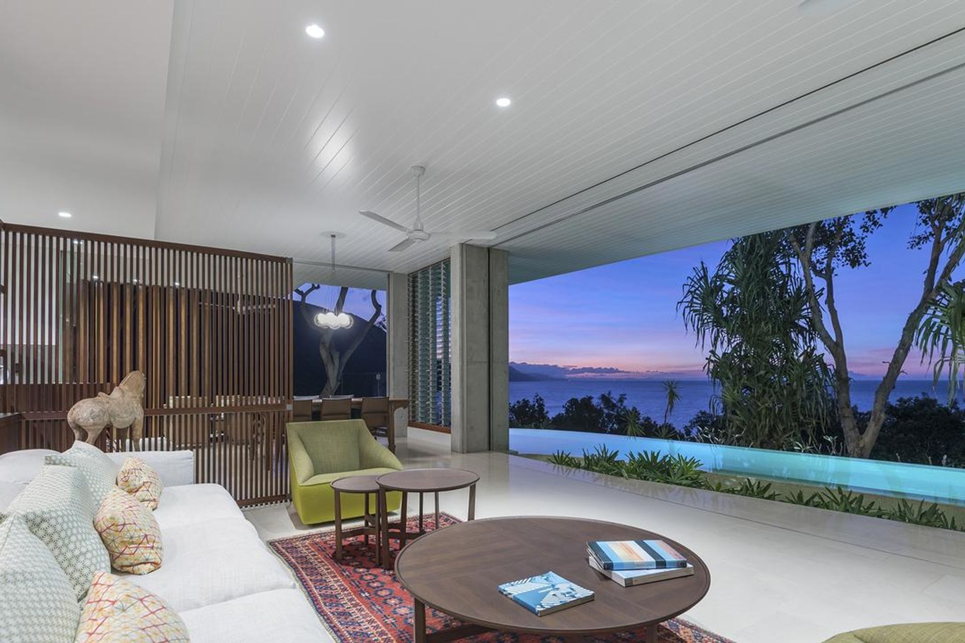 The house was architecturally designed by Roger Mainwood to cantilever over a steep drop.