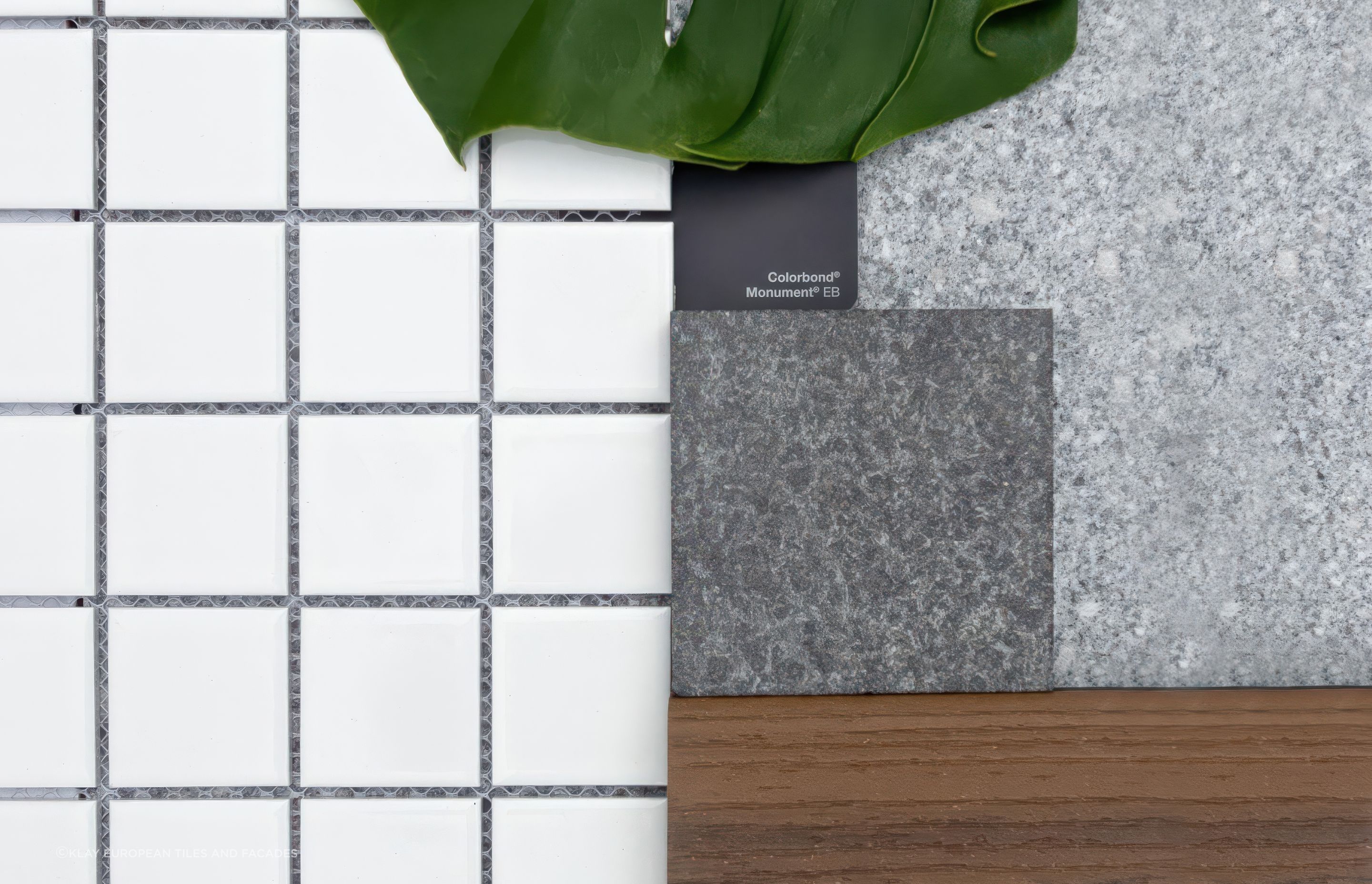 MONOTONE MELBOURNE

Residential White 48x48mm with Ash Granite (background tile) and Panther Black Granite (small swatch) from Pavers Plus