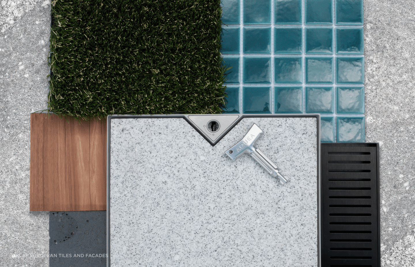 GRANITE &amp; GREEN
Residential Series Jade Green 48×48 with Silver Ash Granite (background tile) and Ice Grey Granite (in the skimmer lid) from Pavers Plus