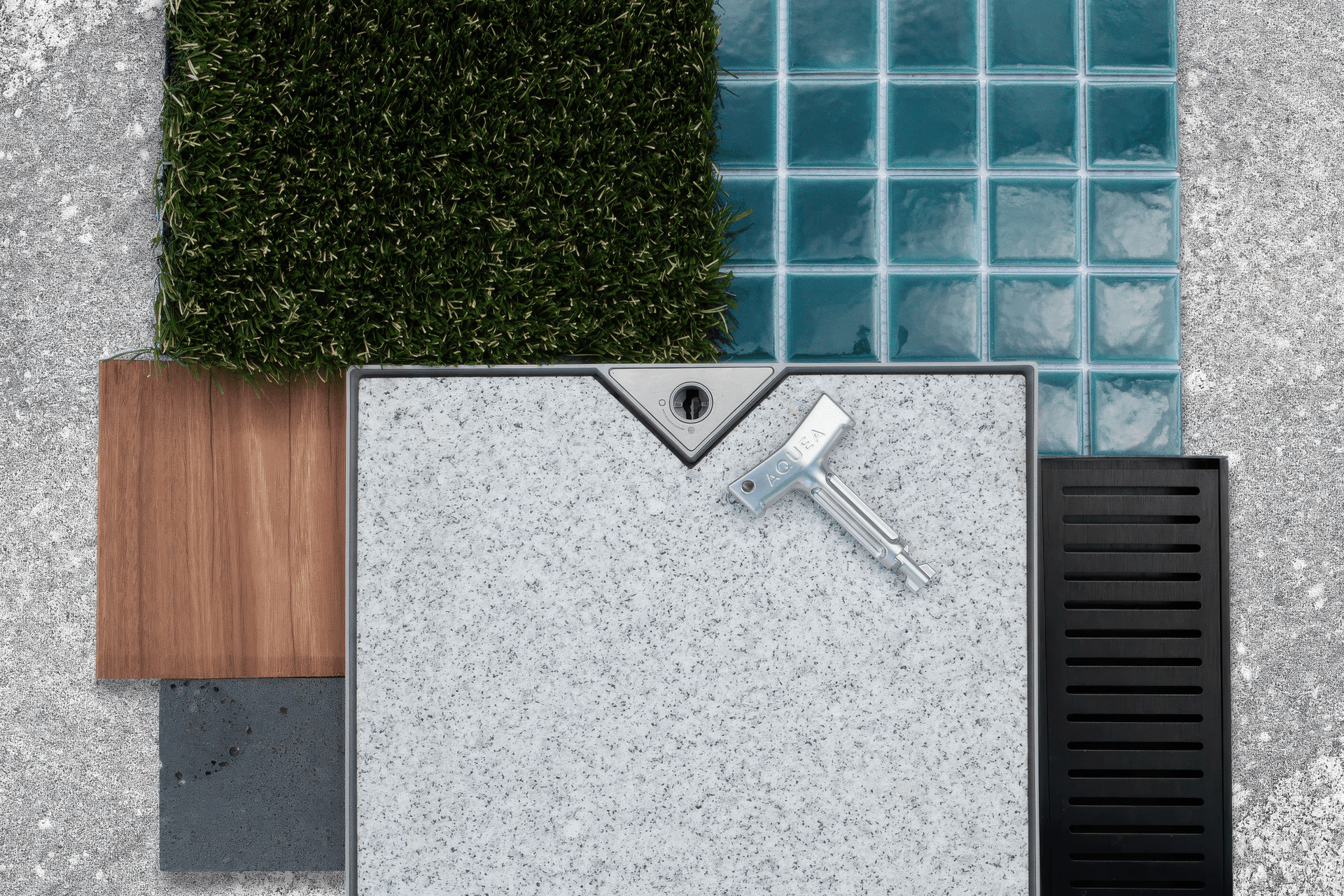 GRANITE &amp; GREEN
Residential Series Jade Green 48×48 with Silver Ash Granite (background tile) and Ice Grey Granite (in the skimmer lid) from Pavers Plus