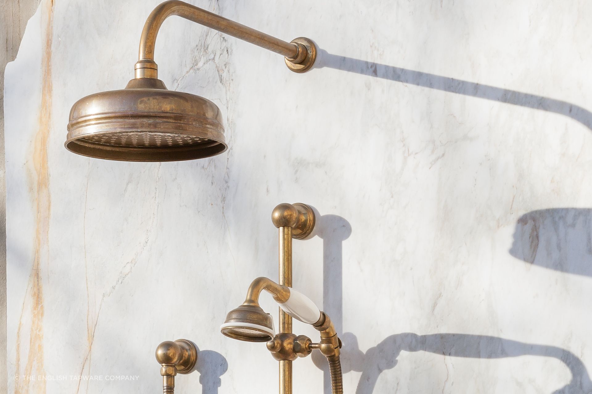 Some showers feature a fixed shower head and a hand shower.