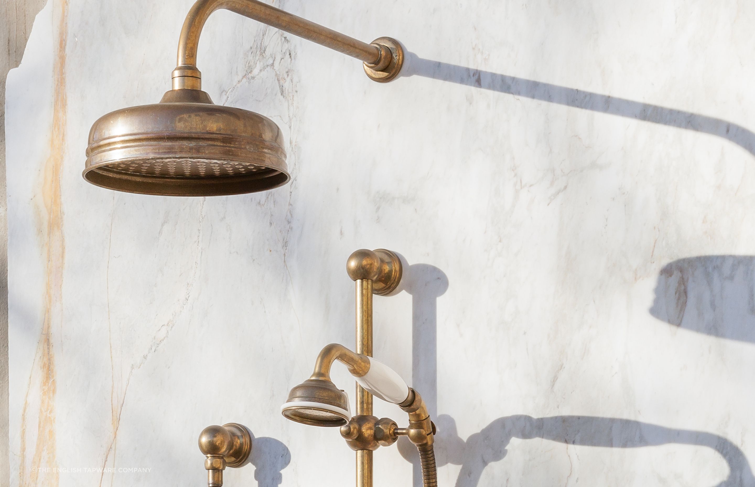 Some showers feature a fixed shower head and a hand shower.