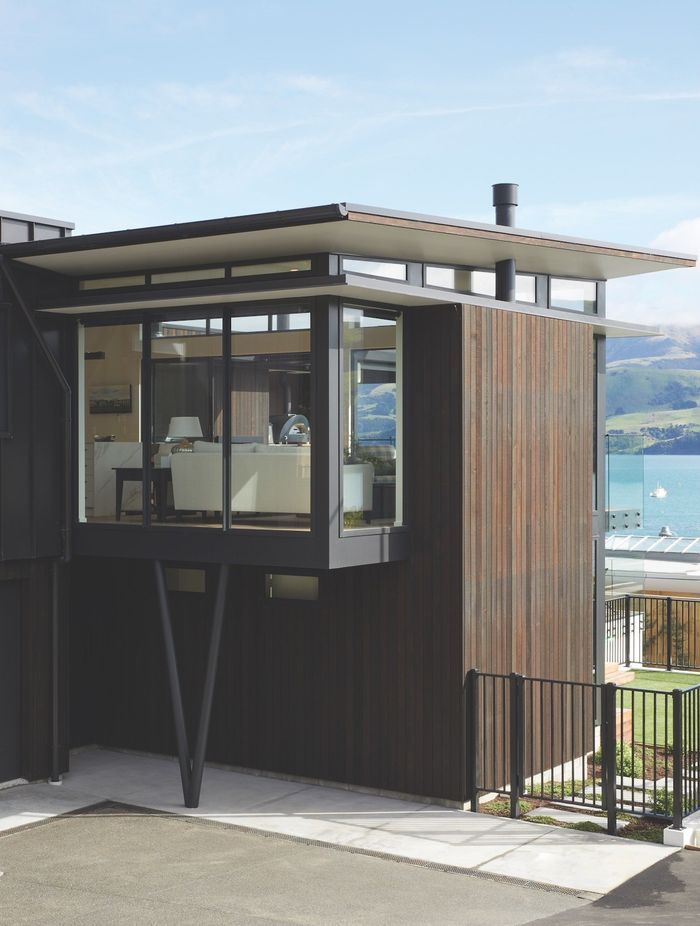 Smooth and sleek: The sleek aesthetic of the tray roof profile has been brought to fruition by the talented team at Reads Roofing, specialists in this type of roofing.