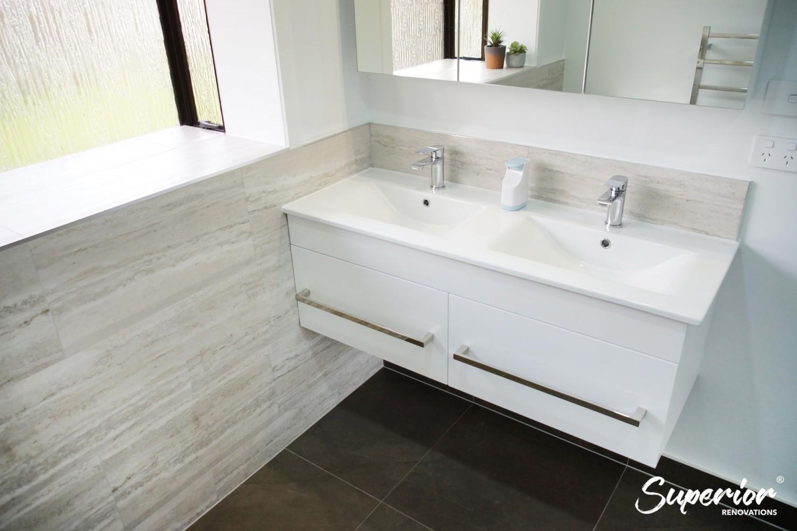 Floating Vanity in this bathroom renovation