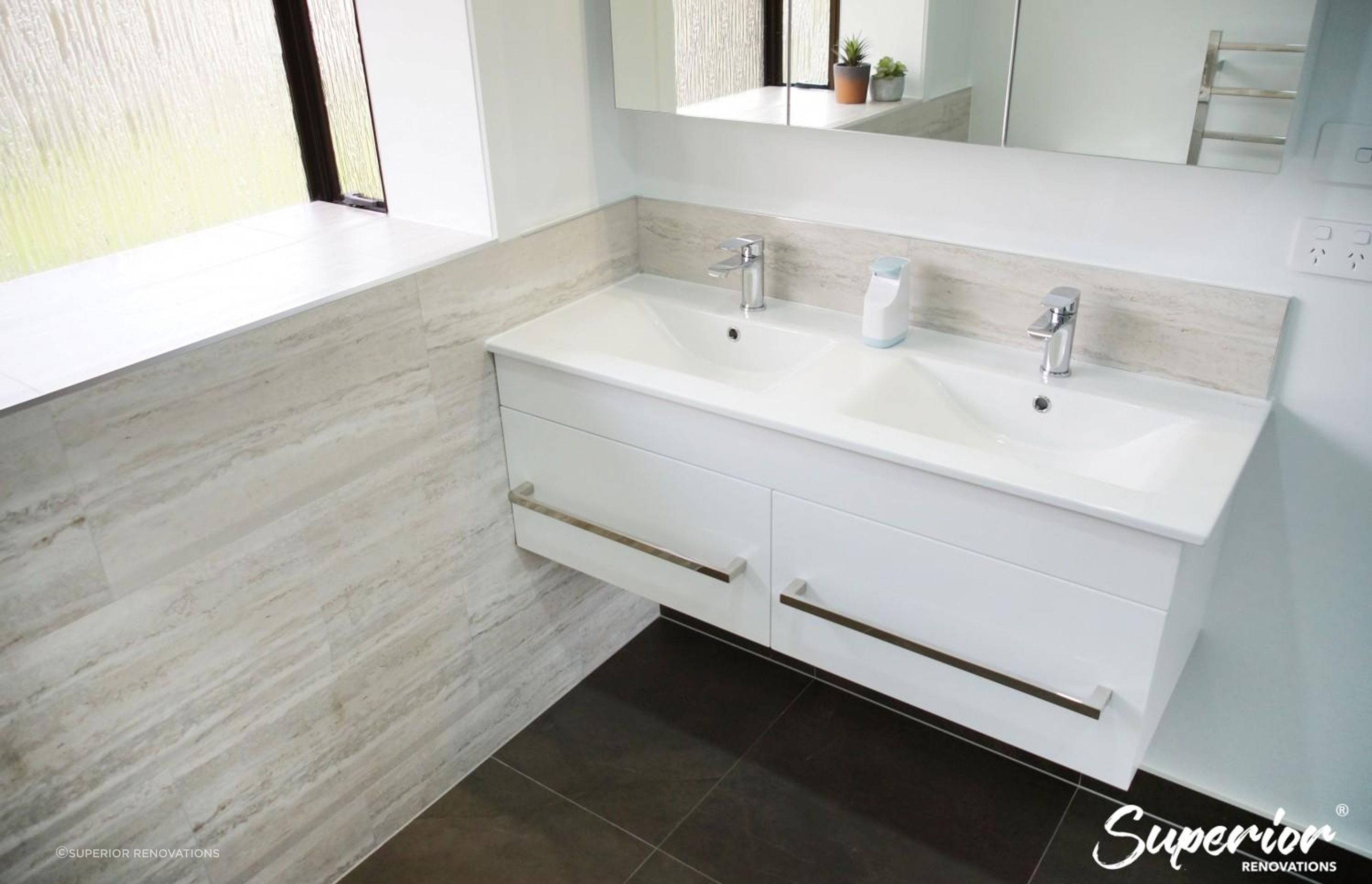 Floating Vanity in this bathroom renovation