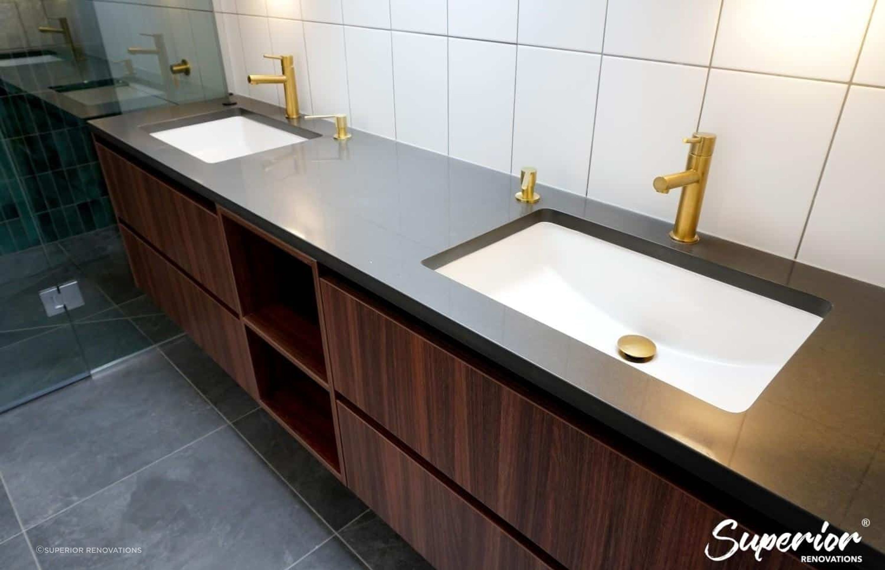 Wood vanity with gold fixtures