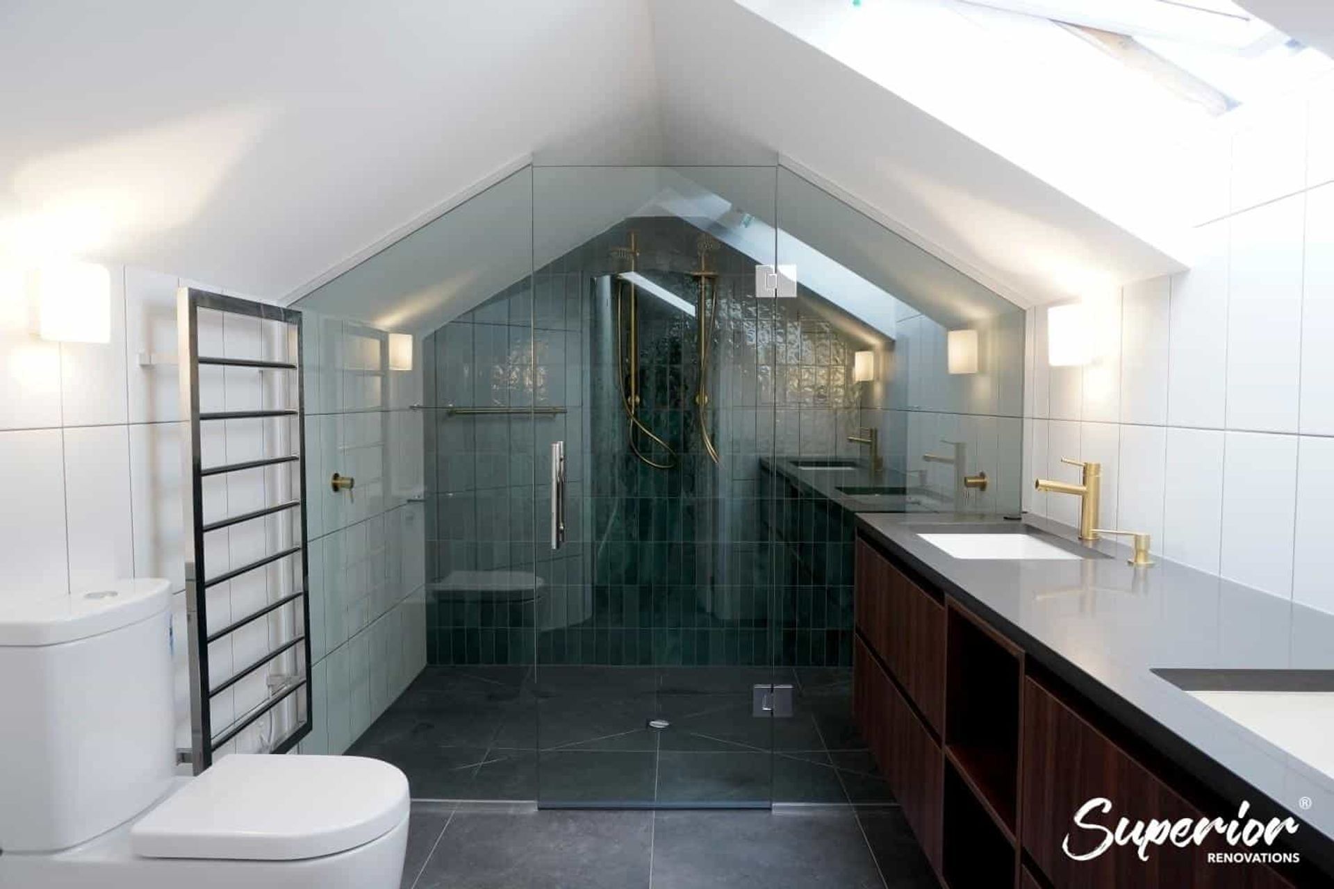 Gold coloured finishing touches for this rustic bathroom