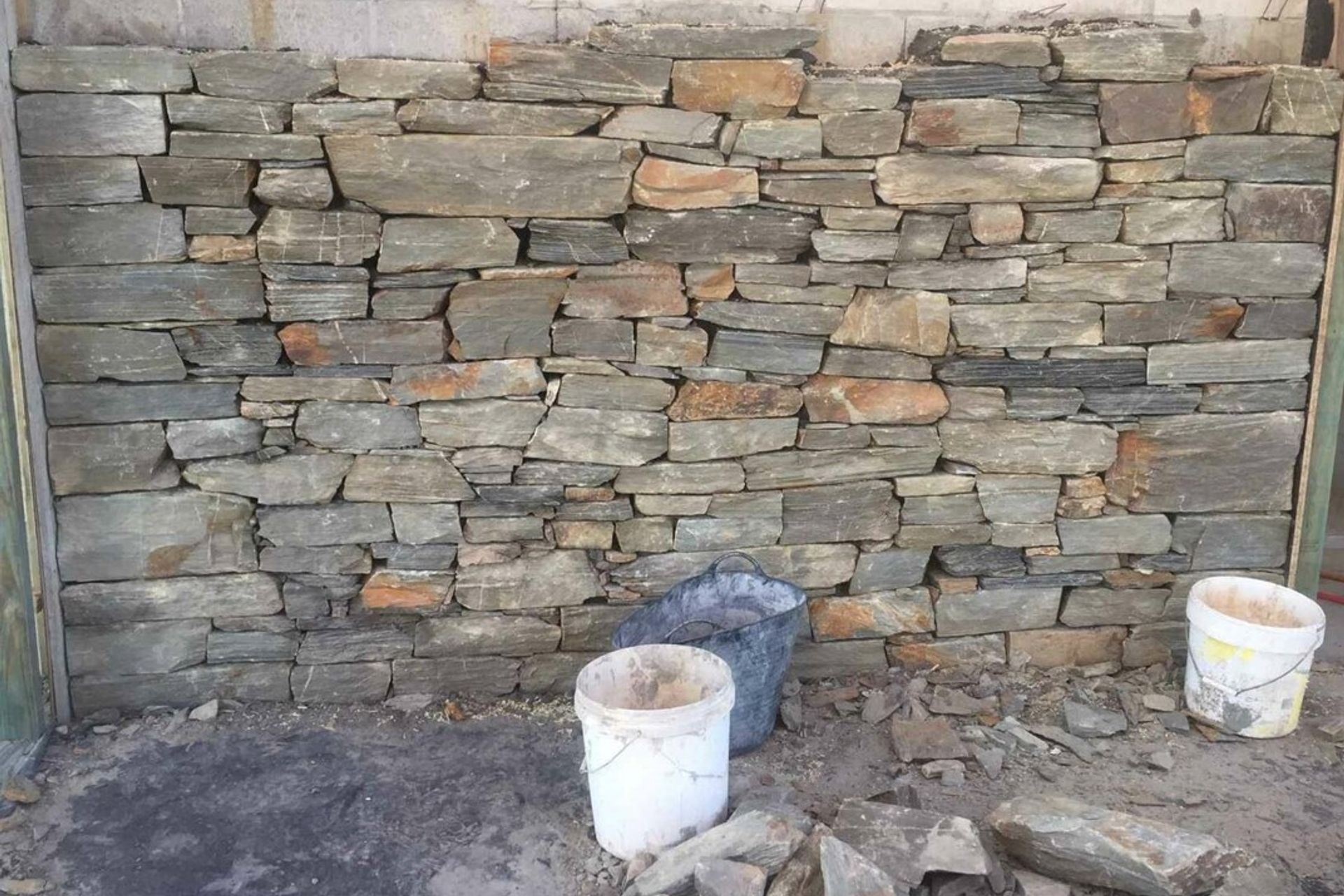 First Attempt - the original stonemason didn't have the right skills to lay this schist way