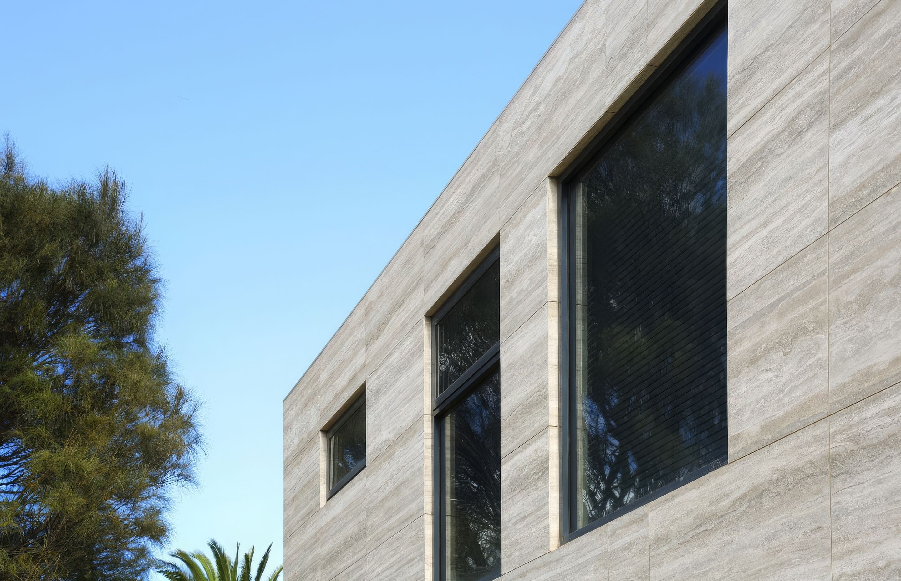 Maximum Travertino porcelain panel cladding. Built by MJB. Designed by Tim Roberts Design.