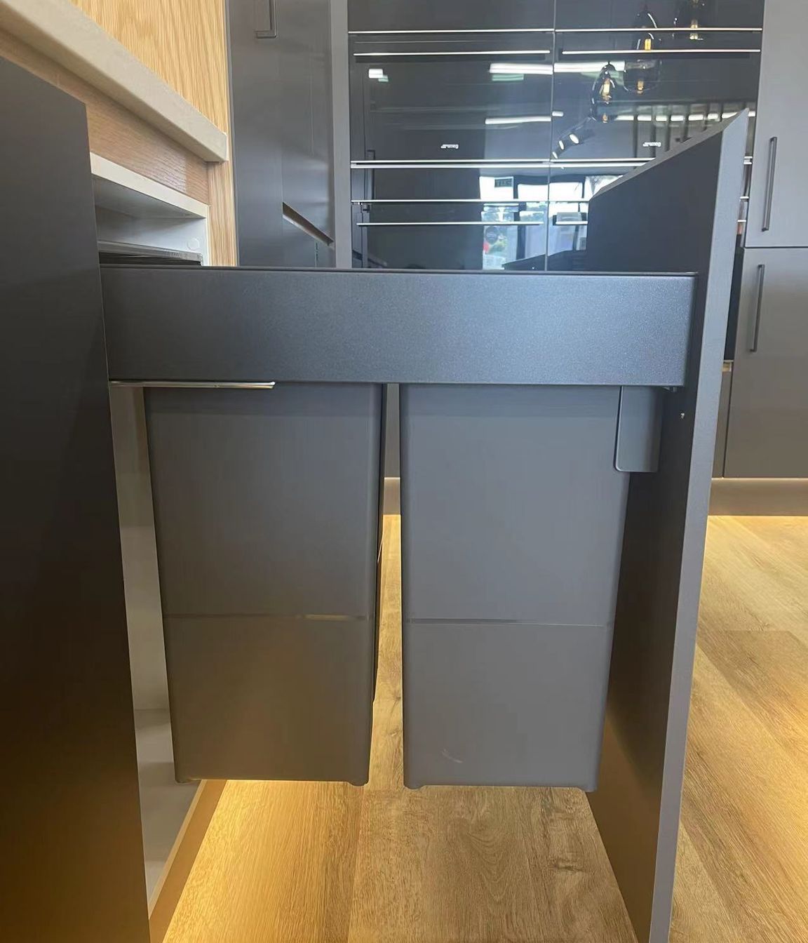 2 Full sized bins that can be pulled out from the cabinets in our Kitchen showroom in Auckland