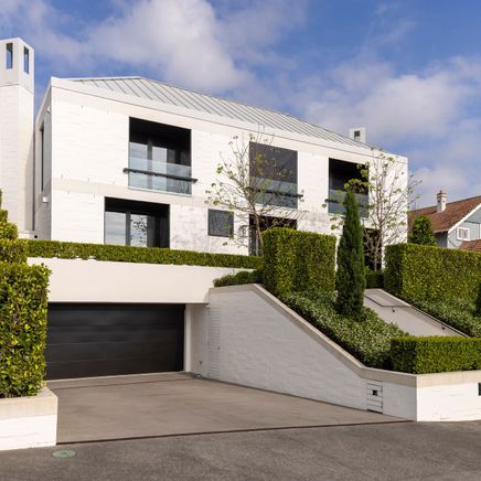 Landscapers create lush, topiary-laden garden for stately Remuera home