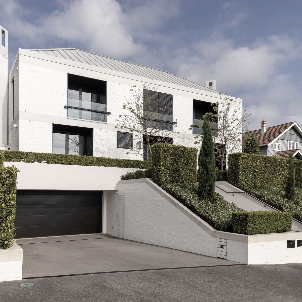 Landscapers create lush, topiary-laden garden for stately Remuera home