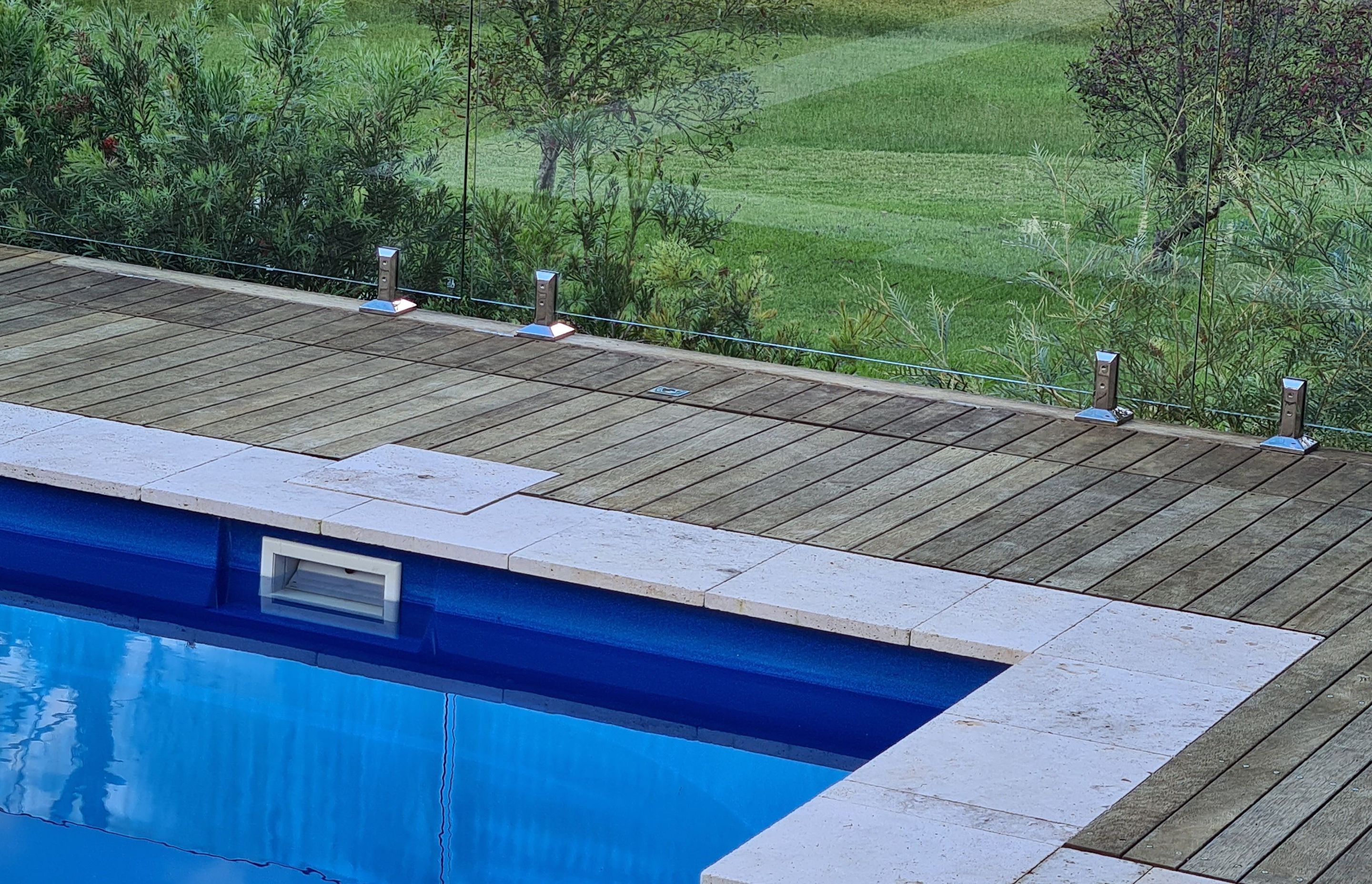 DECKING DELIGHT AT FALLS CREEK | Pool cover system concealed in Merbau decking