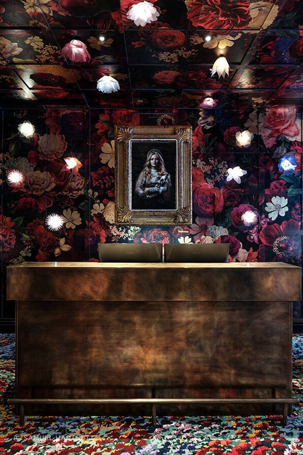 Material Creative weaves a tale from the moment guests step into reception, with rugs based on artwork by Karl Maughan by Designer Rugs. The floral and gold leaf wall mural was created by Haley Brown of The Art Dept and the photograph is by Ross Brown.