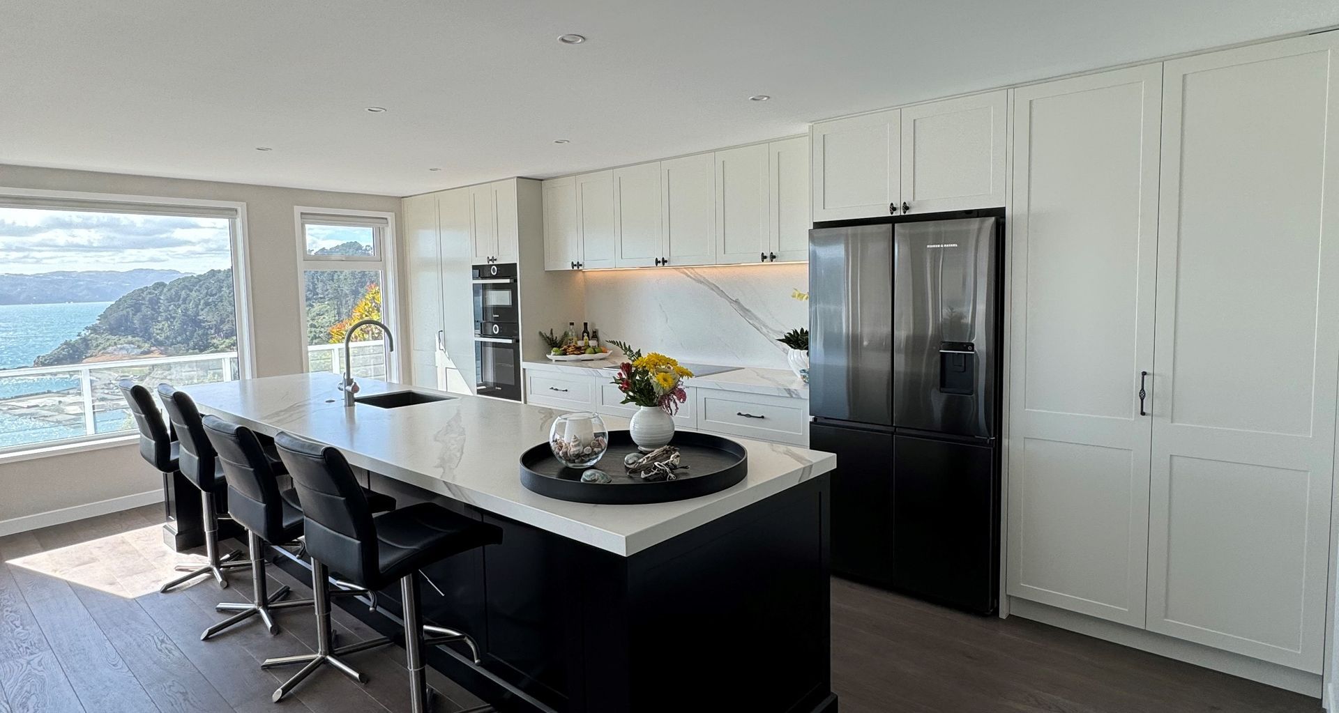 Beautiful sea views on a classic and elegant kitchen by Prime Interiors