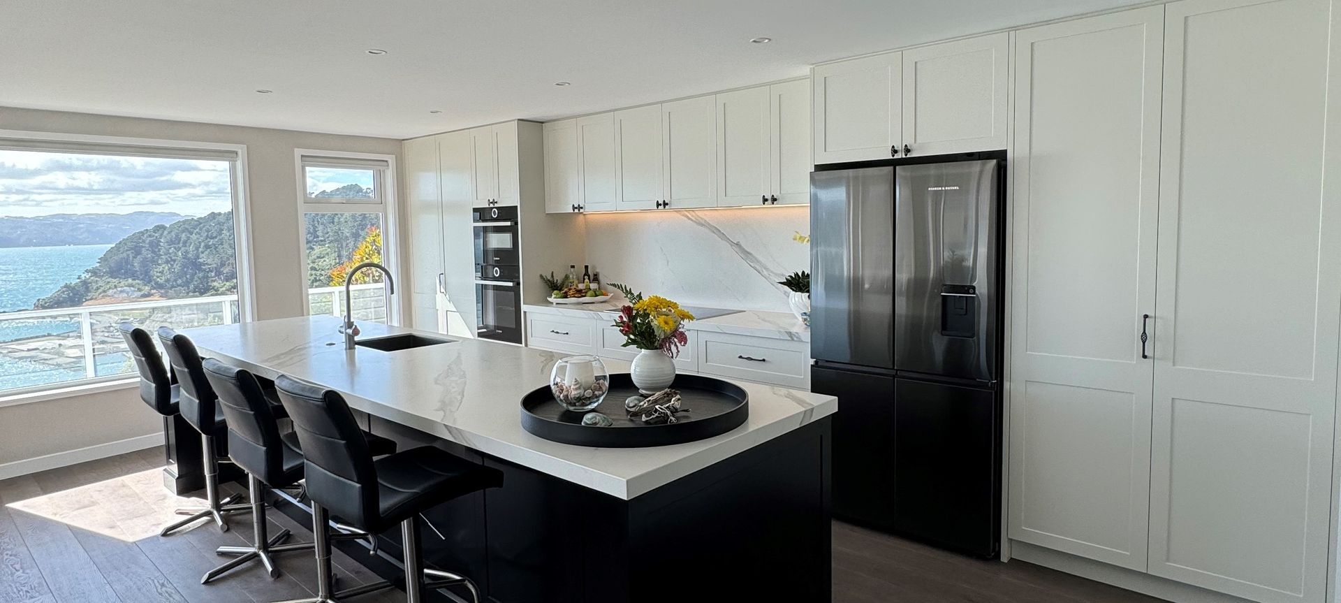 Beautiful sea views on a classic and elegant kitchen by Prime Interiors