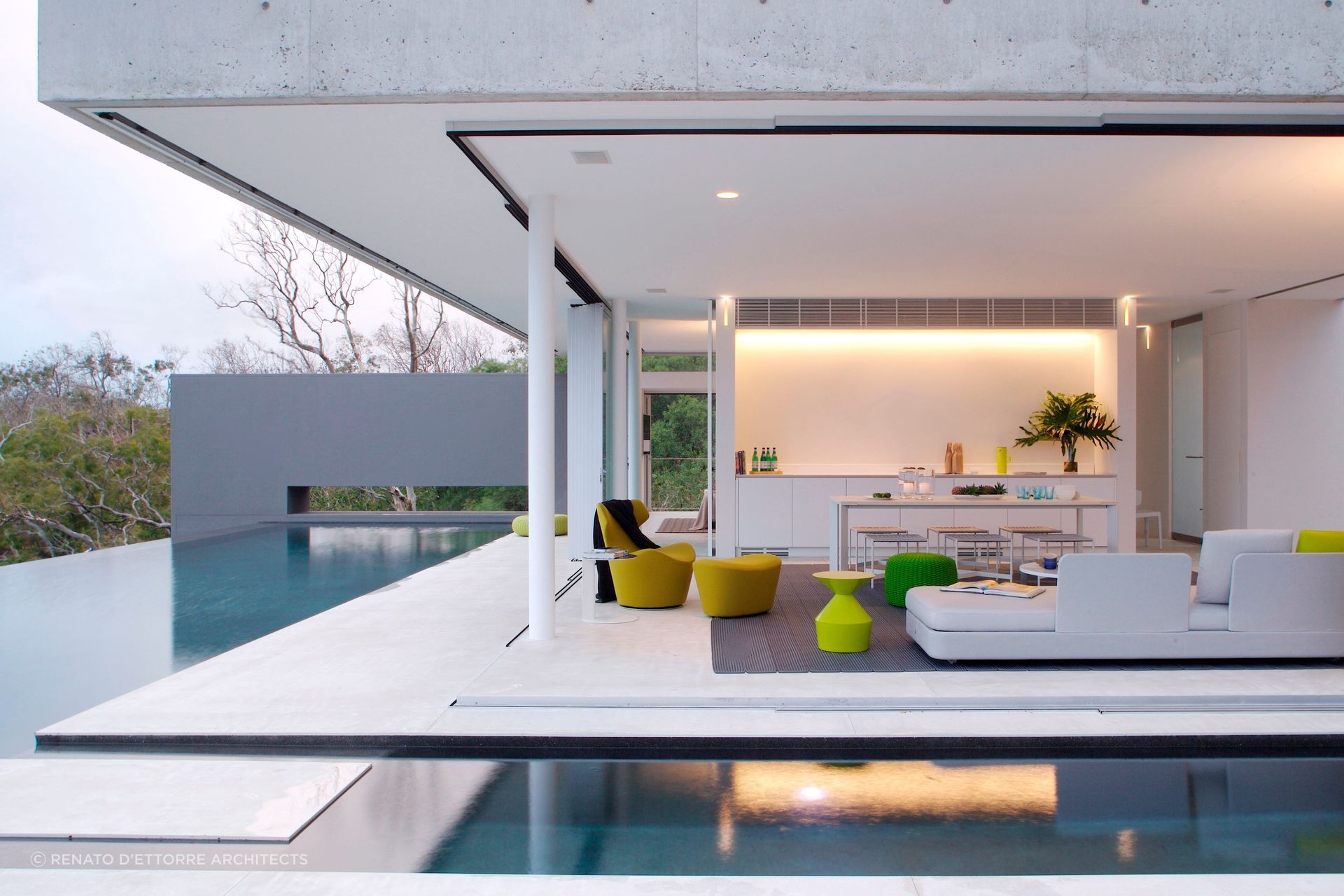 Azuris, Hamilton Island by Renato D'Ettorre Architects | Photography by Francesca Giovanelli - colourful furniture and an open plan design can give your backyard or pool area a relaxed feel.