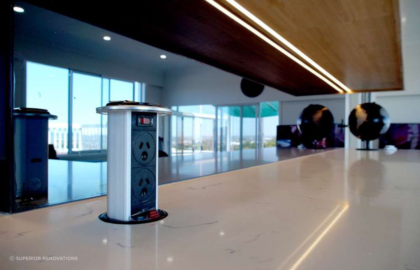 Kitchen renovation in Massey: These ‘pop out power outlets’ were installed on the counter top which can be pulled up when needed and pushed back down when not in need.