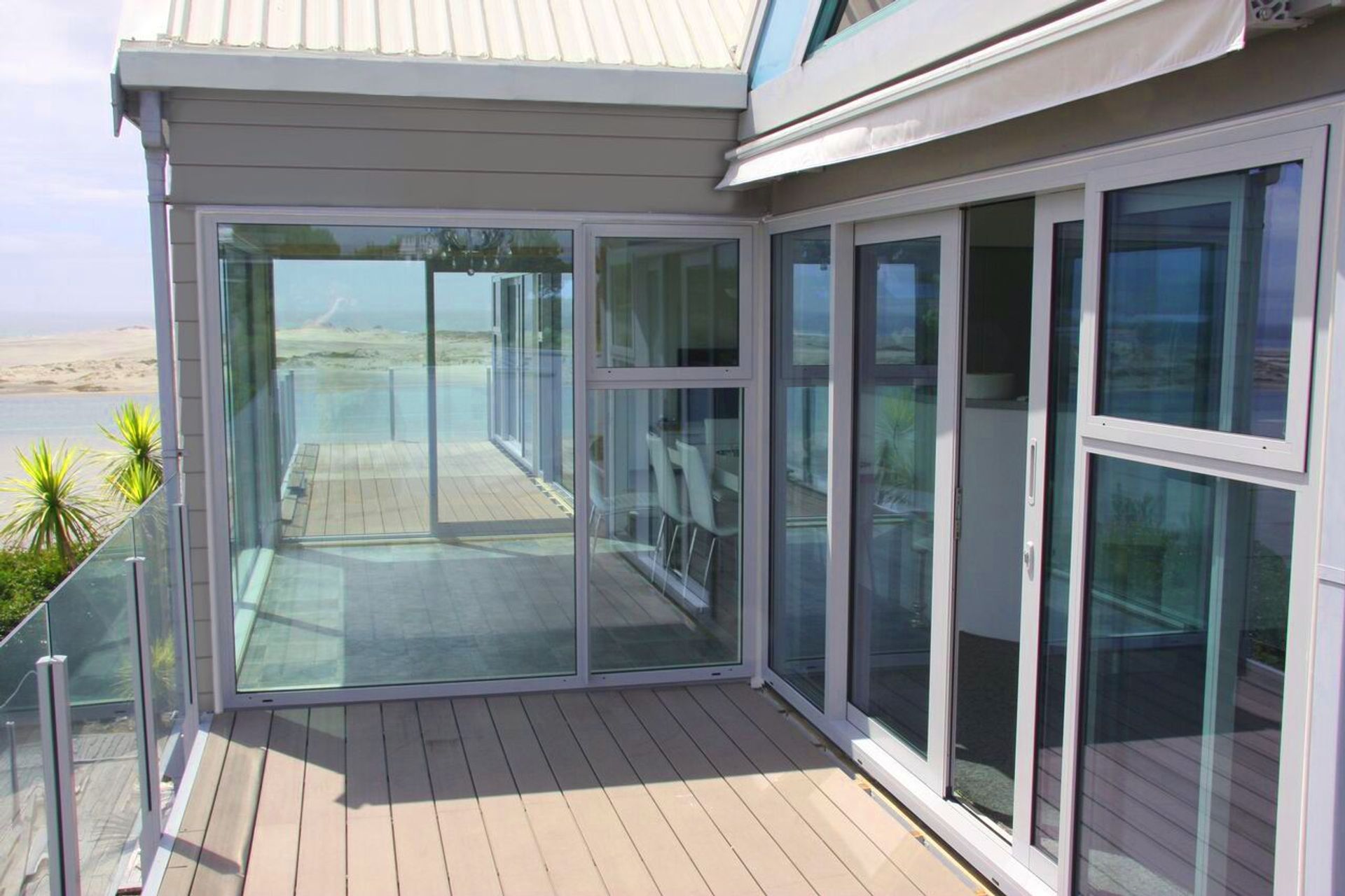 New Replacement Windows and Doors freshen up this stunning home in both aesthetics and improved options for ventilation.