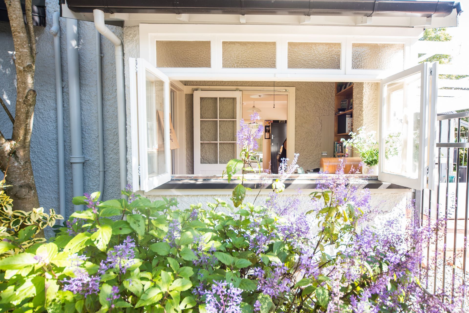Bifold windows are not only for aluminium joinery. Timber bifold windows retain their natural character whilst bringing the outside in.