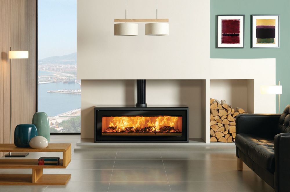 With its panoramic viewing window and tilt-down door to minimise ash fall beyond the hearth, The Stovax Studio 3 is available as a free-standing (pictured) or built-in model.
