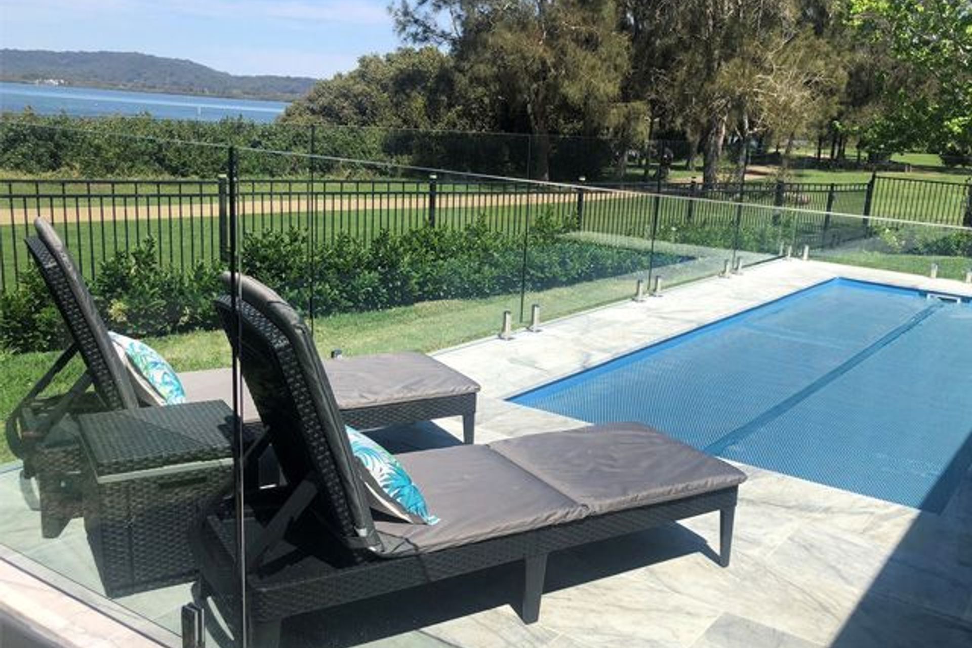 RIVERSIDE RETREAT | POOL COVER SYSTEM CONCEALED UNDER MARBLE TILES
