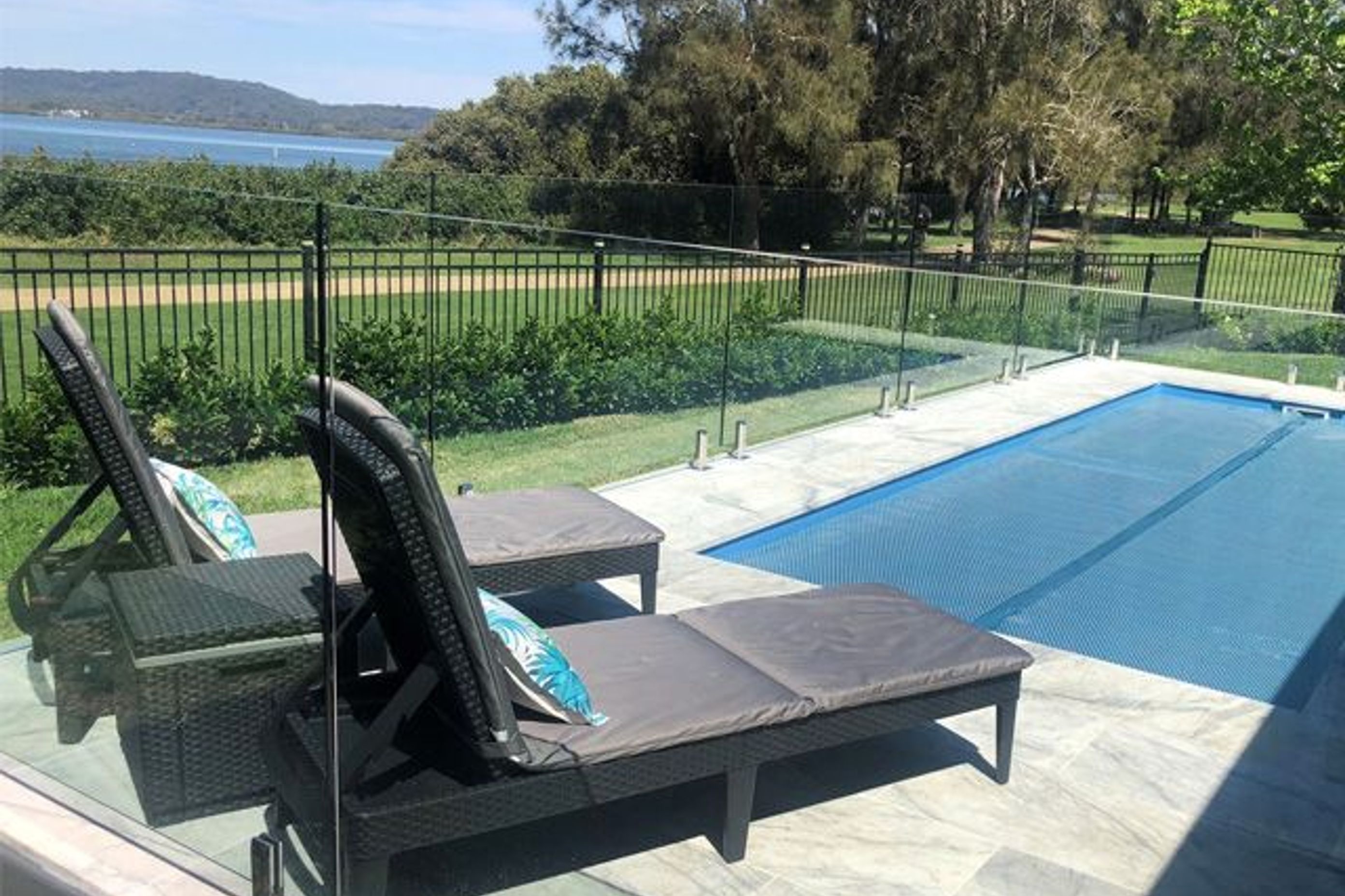 RIVERSIDE RETREAT | POOL COVER SYSTEM CONCEALED UNDER MARBLE TILES
