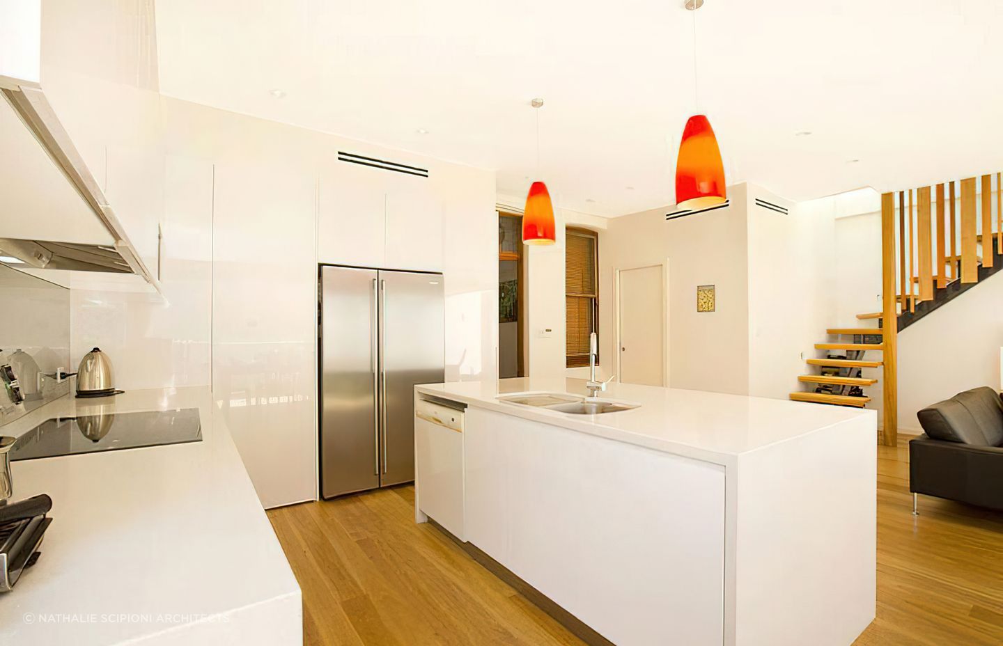 Wood composite hybrid flooring is a popular option for environments where splashes and spills occur, such as a kitchen.