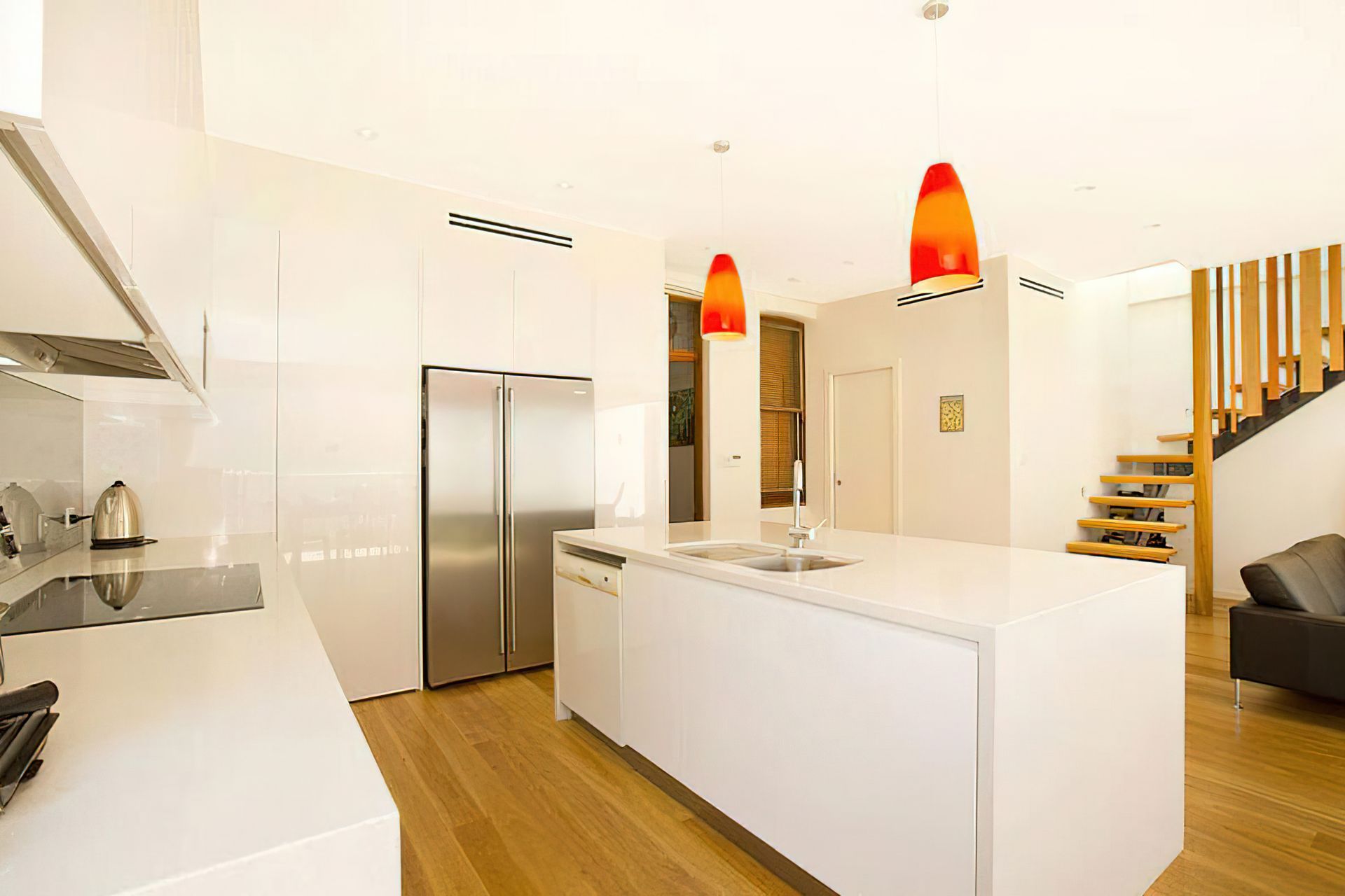 Wood composite hybrid flooring is a popular option for environments where splashes and spills occur, such as a kitchen.