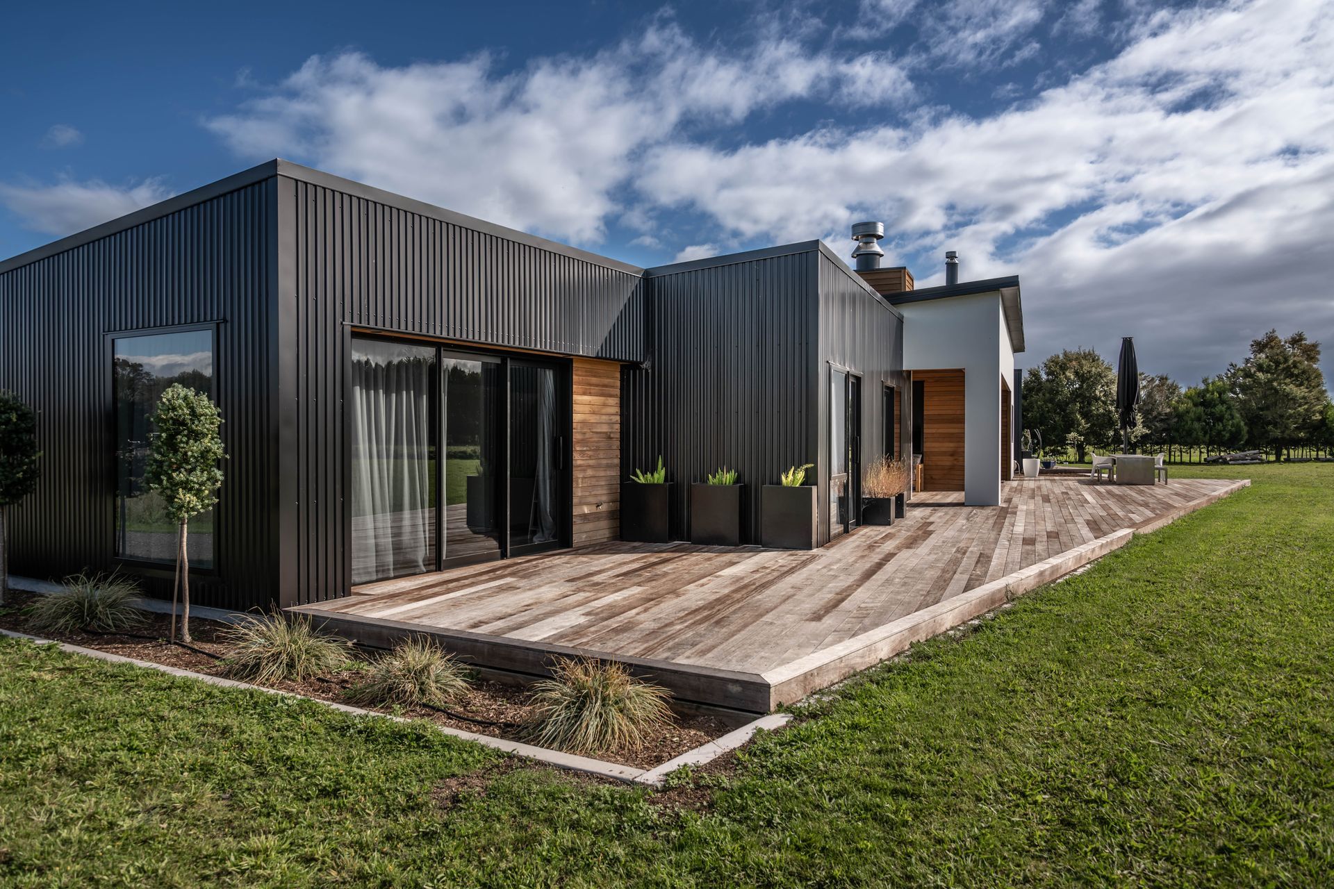 The variety of cladding materials creates visual interest on this contemporary home.
