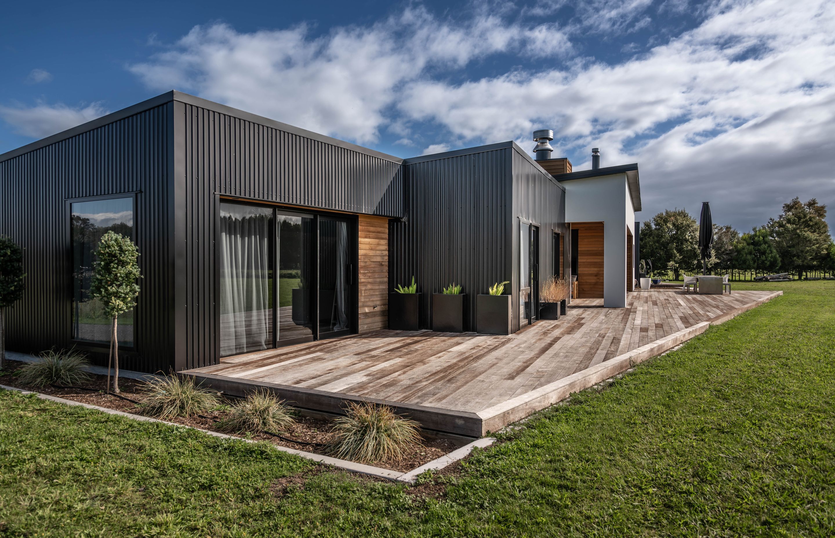 The variety of cladding materials creates visual interest on this contemporary home.