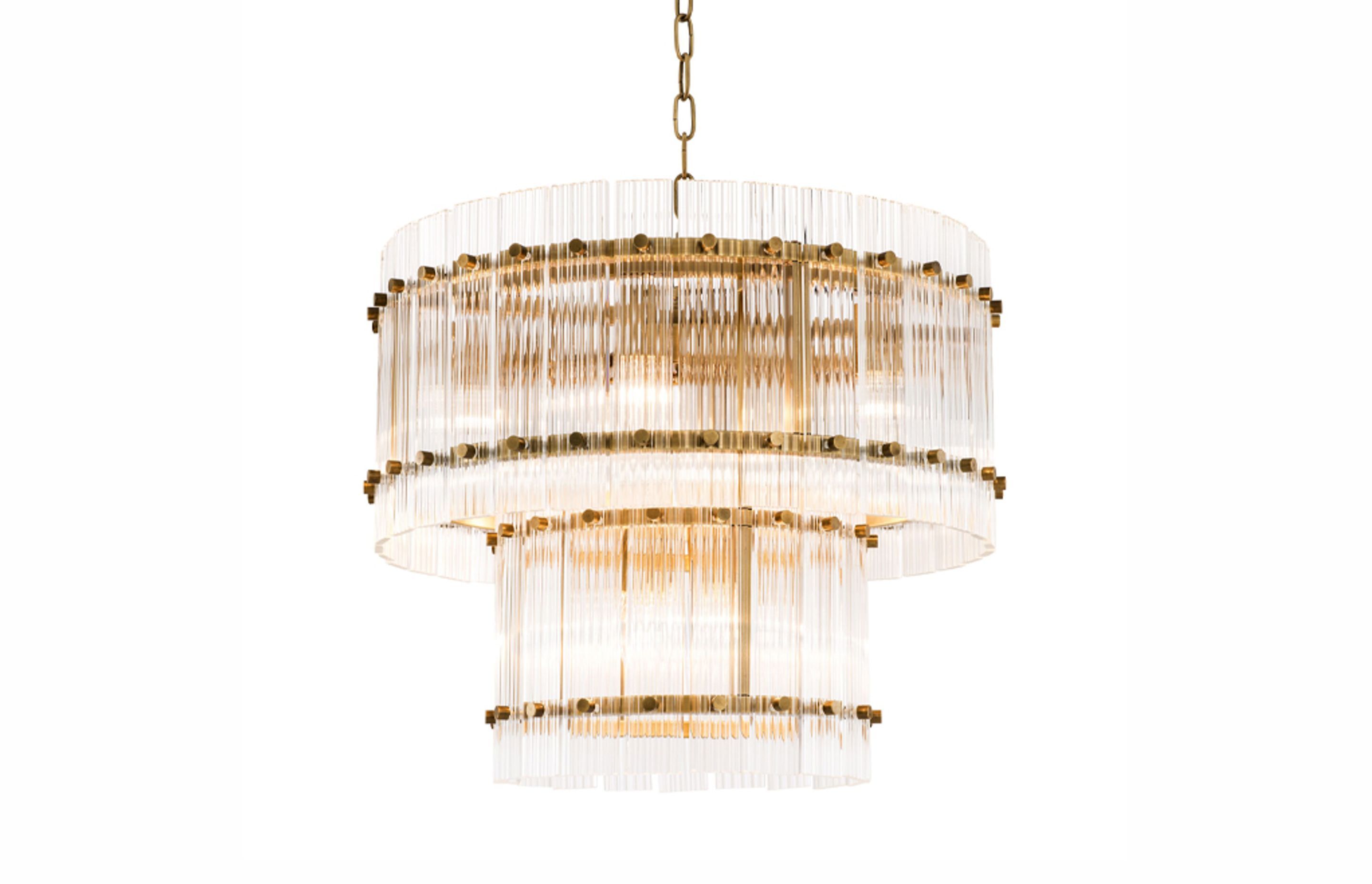 Fluted glass lighting like the Ruby chandelier from TRENZSEATER can add a stunning Art Deco-style feature in your interiors,