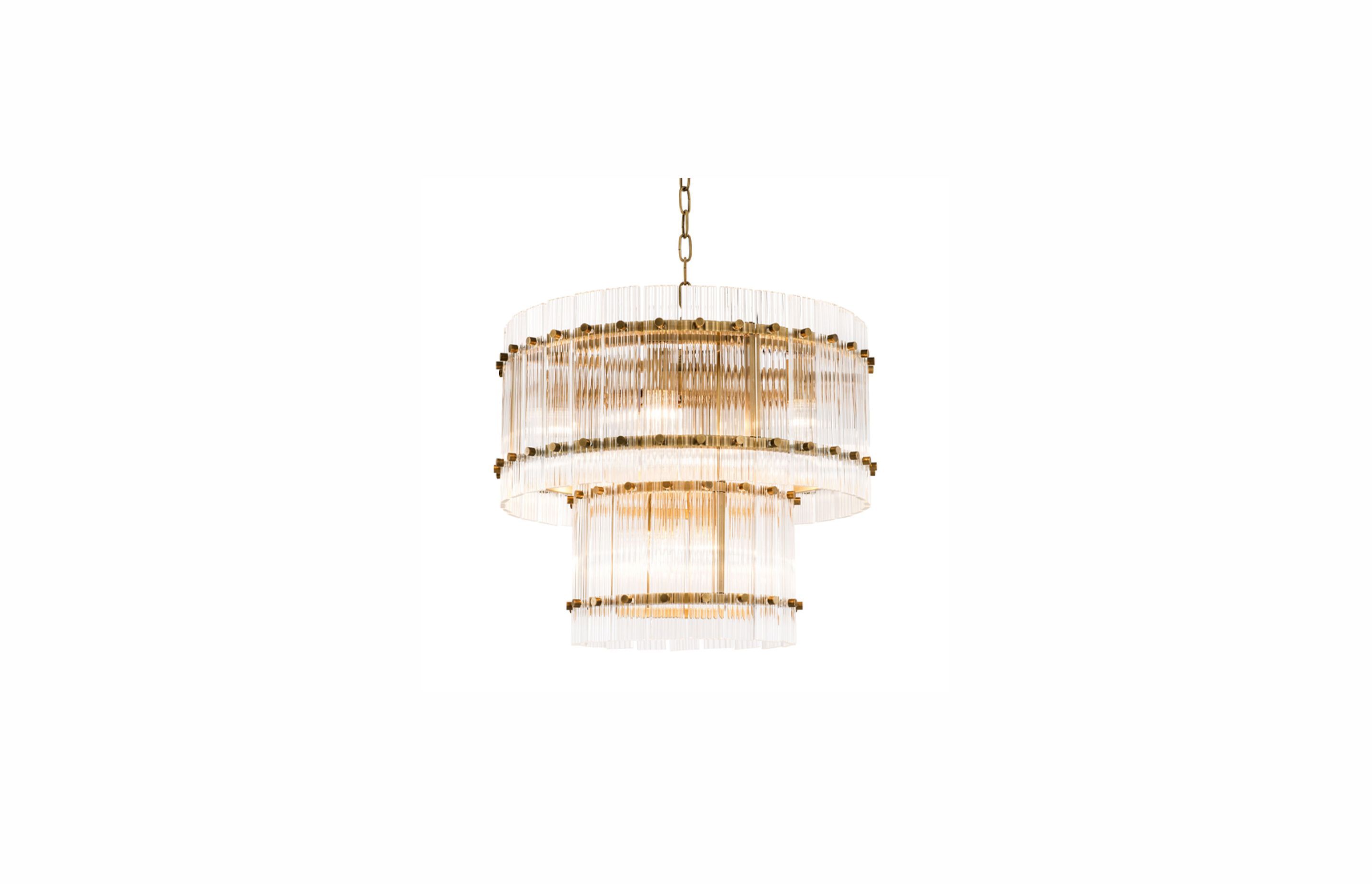 Fluted glass lighting like the Ruby chandelier from TRENZSEATER can add a stunning Art Deco-style feature in your interiors,