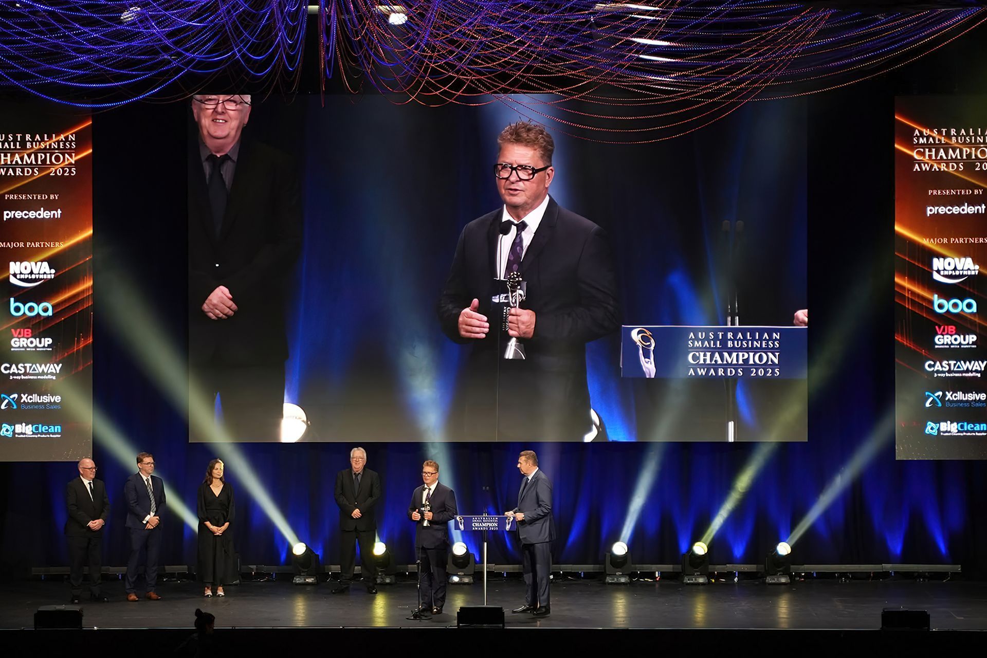 Schweigen Co-Owner, Anthony Fletcher, accepts the Specialised Retail Champion Award.