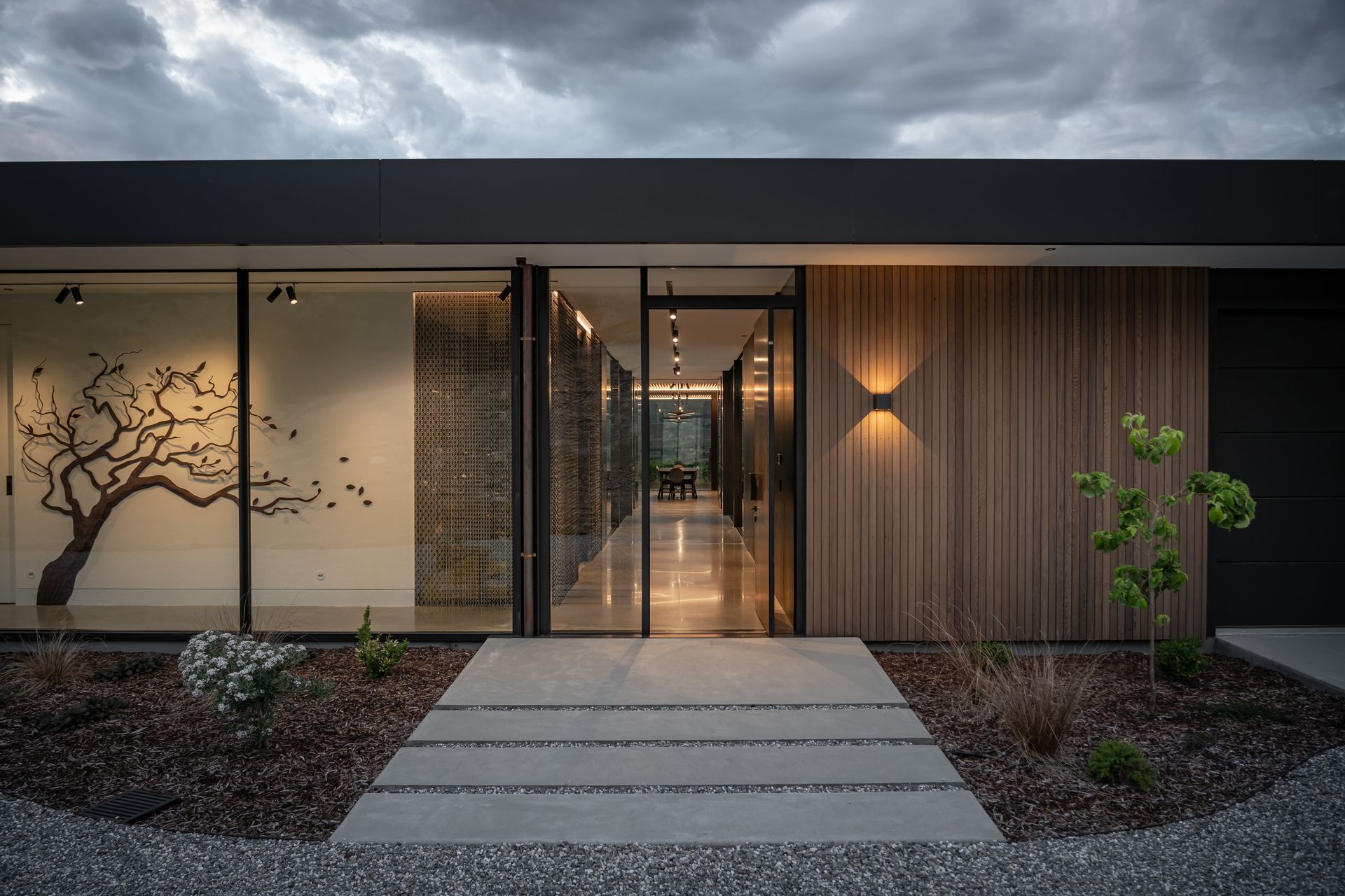 The front entrance to the house, positioned at the eastern pavilion. | Photographer: Simon Larkin