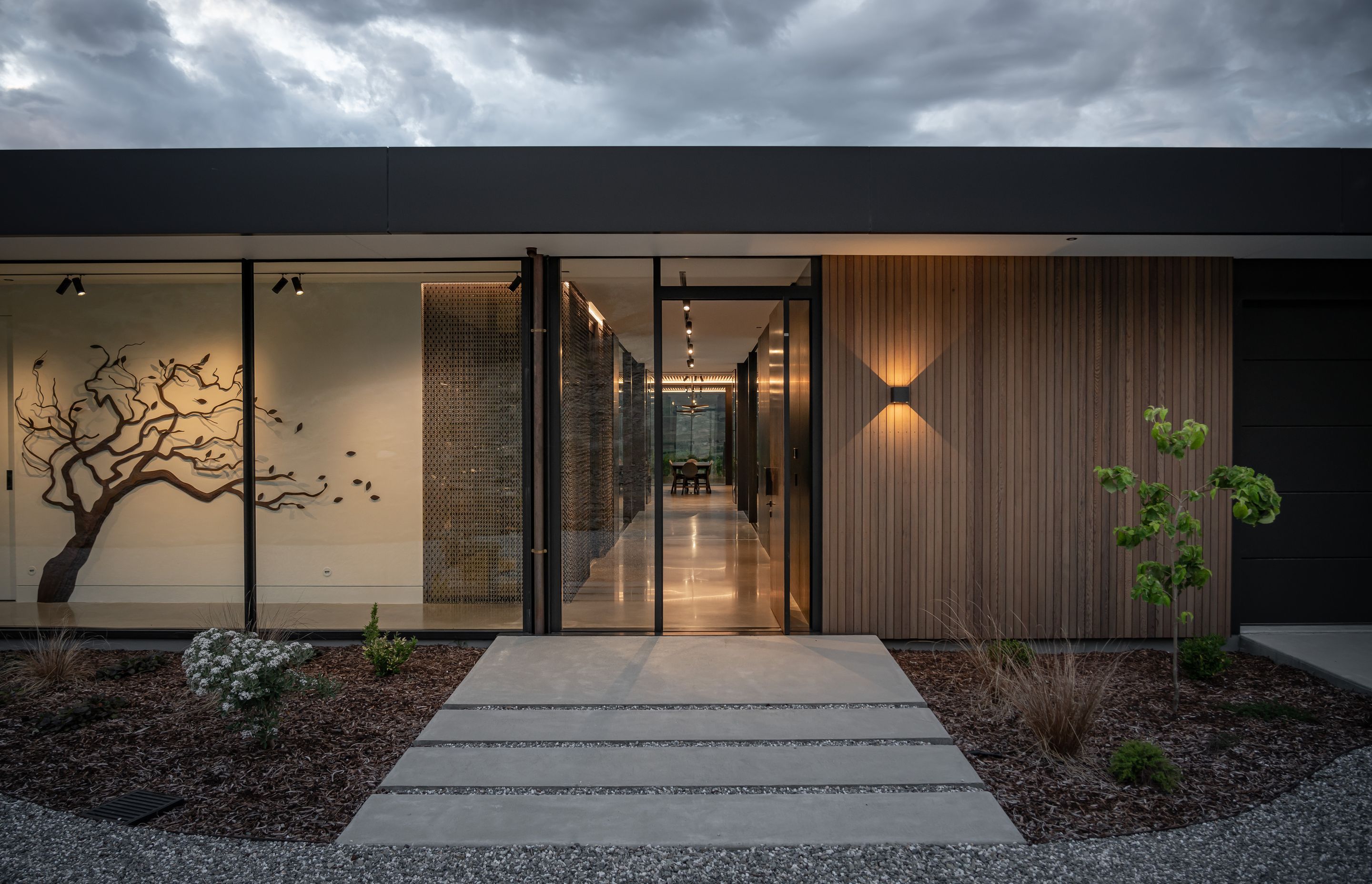 The front entrance to the house, positioned at the eastern pavilion. | Photographer: Simon Larkin