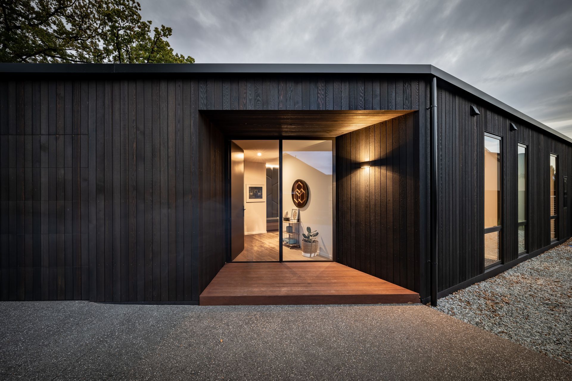 Creating a sense of perspective can be a great way to draw the eye when it comes to entryway design, expertly executed at this Oak Grove Residence - Photography: Larkin Photography