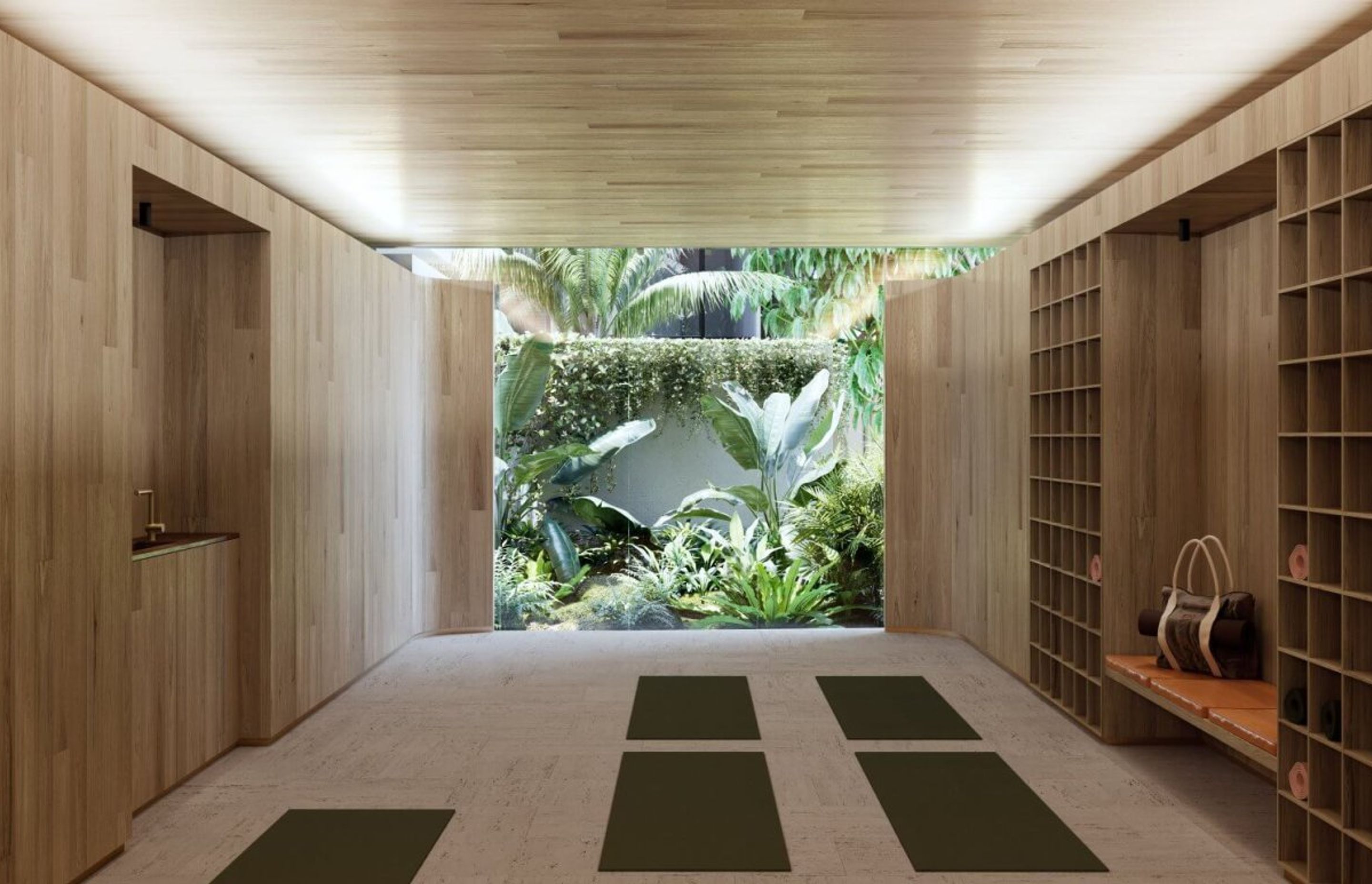 Lush tropical gardens are combined with running water and reflective surfaces throughout the lower level landscaping, while hydroponic green walls are dotted around the development.
