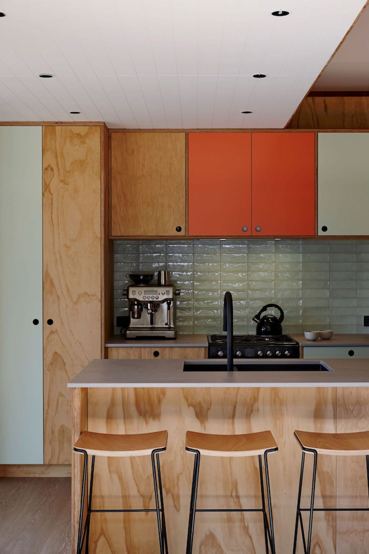 Ply is the dominant material throughout the interior, and is peppered with happy colour.