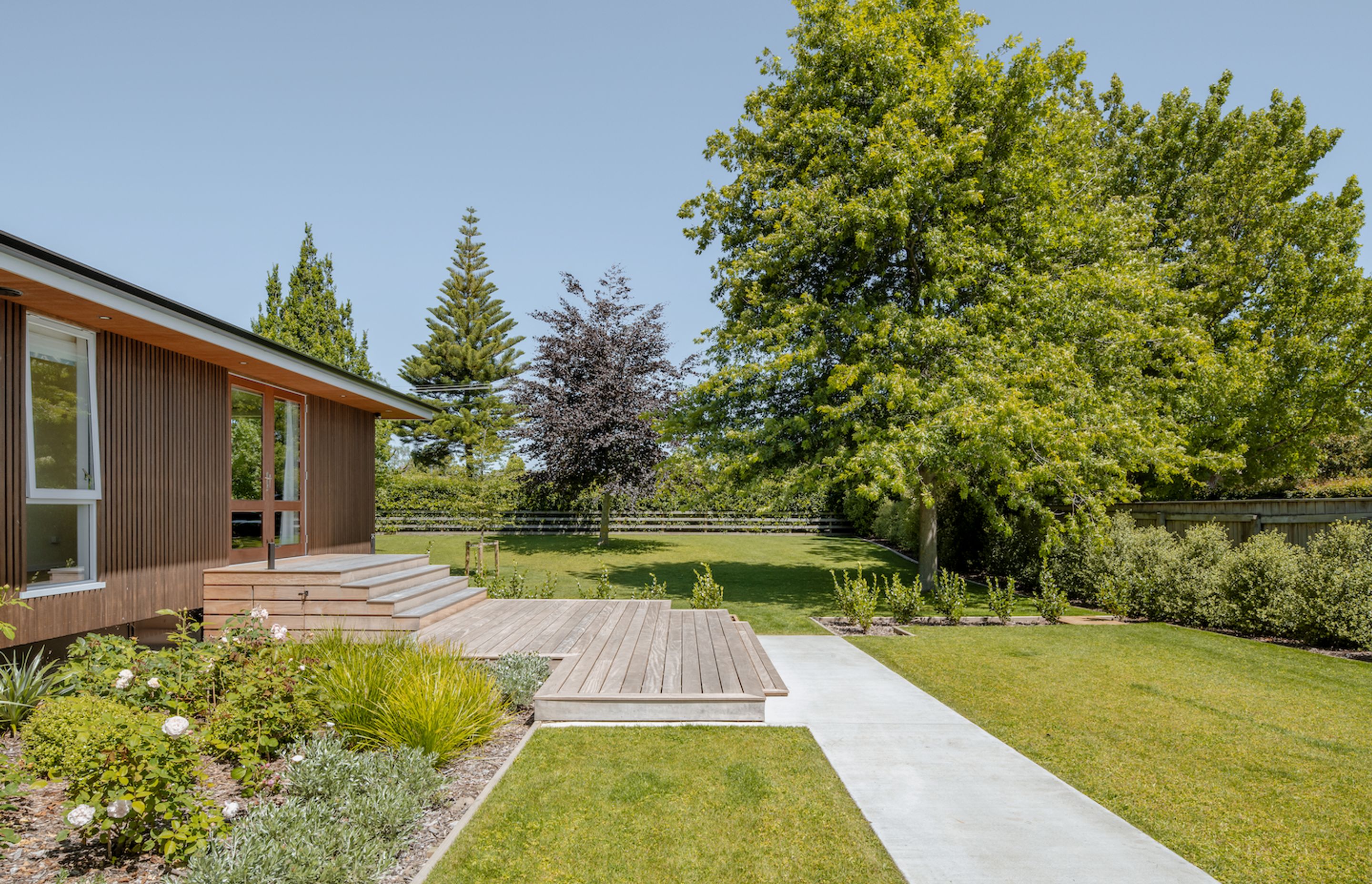 Work on the house concluded with landscaping.